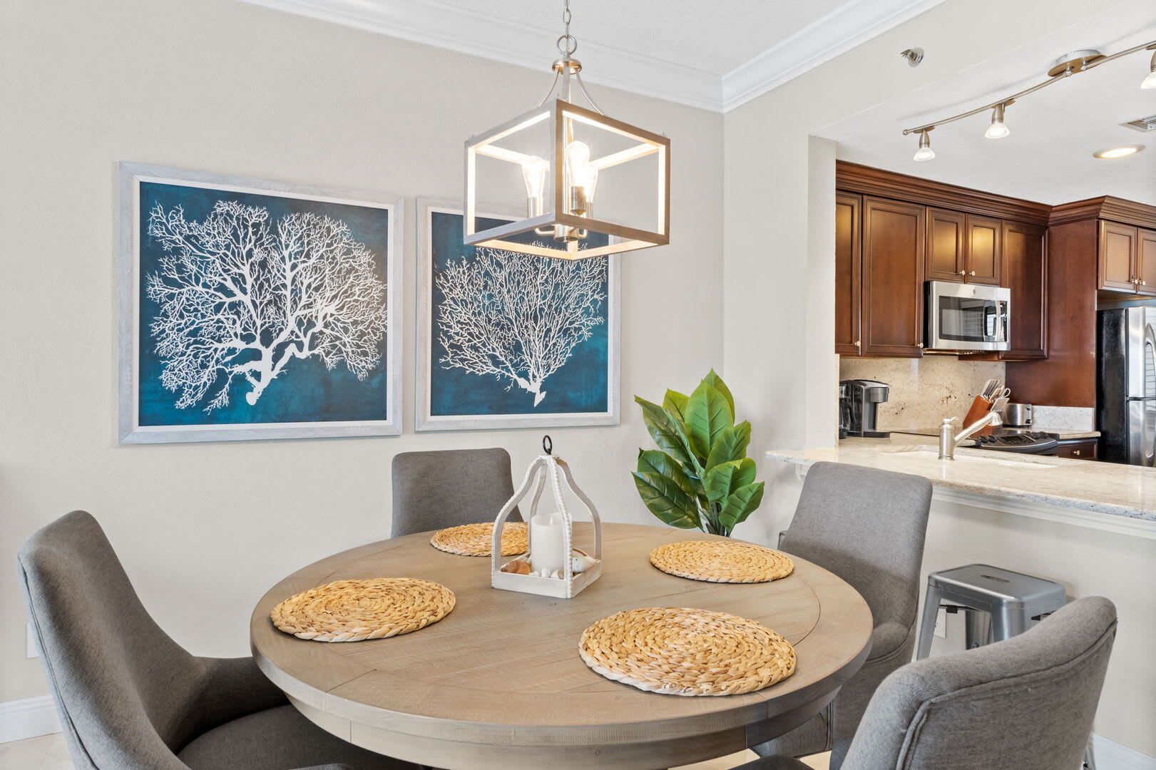 Dining table with comfortable plush chairs for a full meal, snack or for a friendly card game.