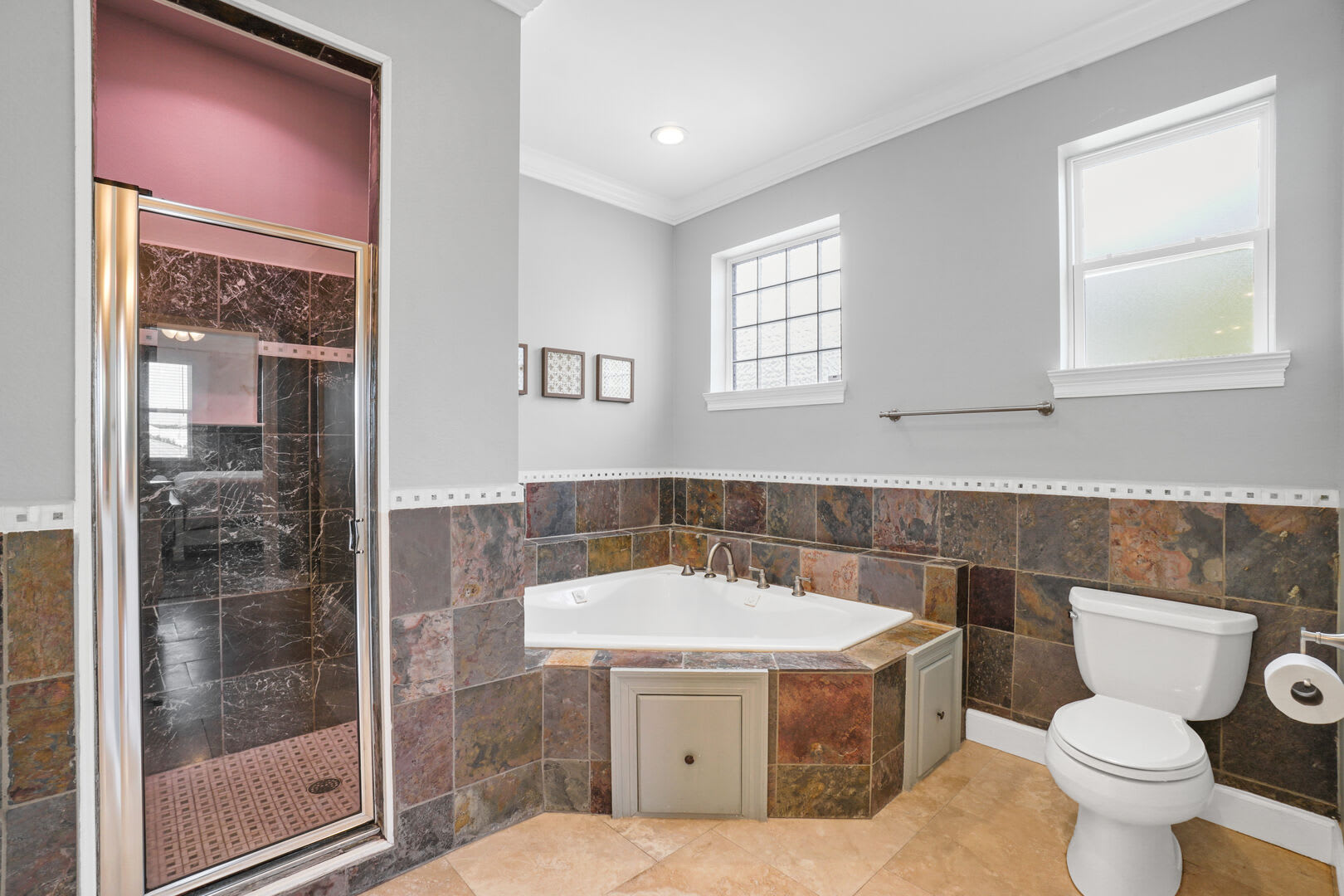 Step in shower and great soaking tub/jacuzzi.