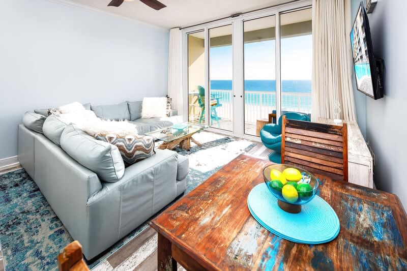 Living Room with Balcony - Waters Edge Resort unit 613 Okaloosa Island Fort Walton Beach Vacation Rentals by Sunset Resort Rentals