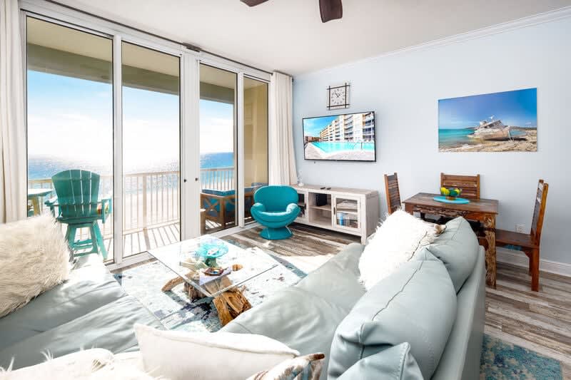 Living Room with Balcony - Waters Edge Resort unit 613 Okaloosa Island Fort Walton Beach Vacation Rentals by Sunset Resort Rentals