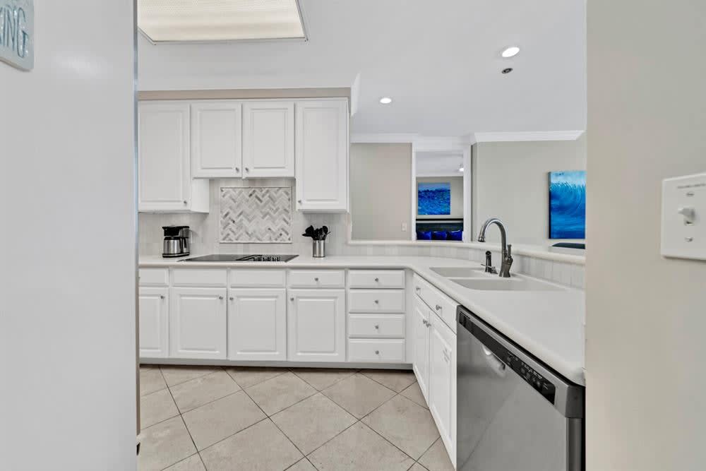 Stunning kitchen with brand new backsplash tile and modern conveniences.