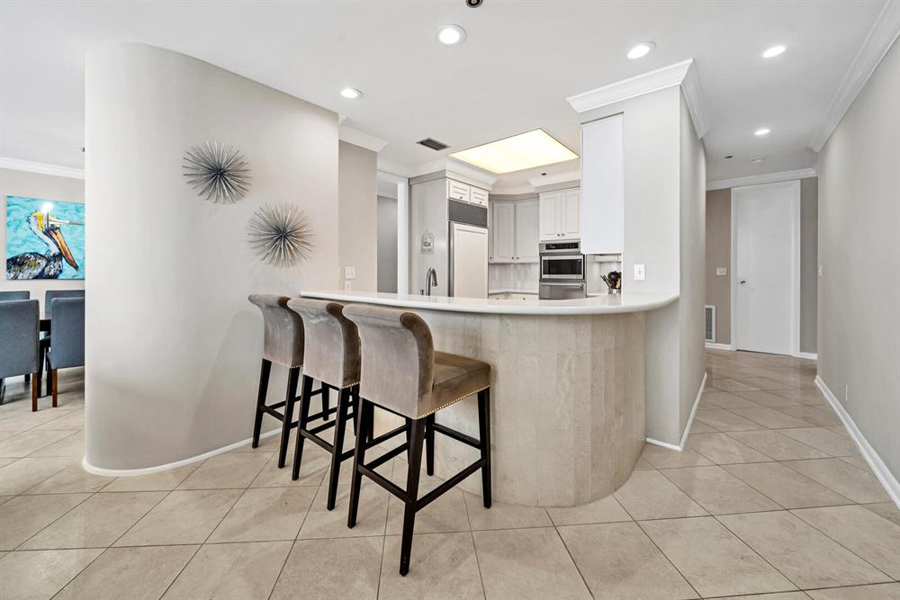 3 large comfortable barstools are perfect for visiting with the chefs!