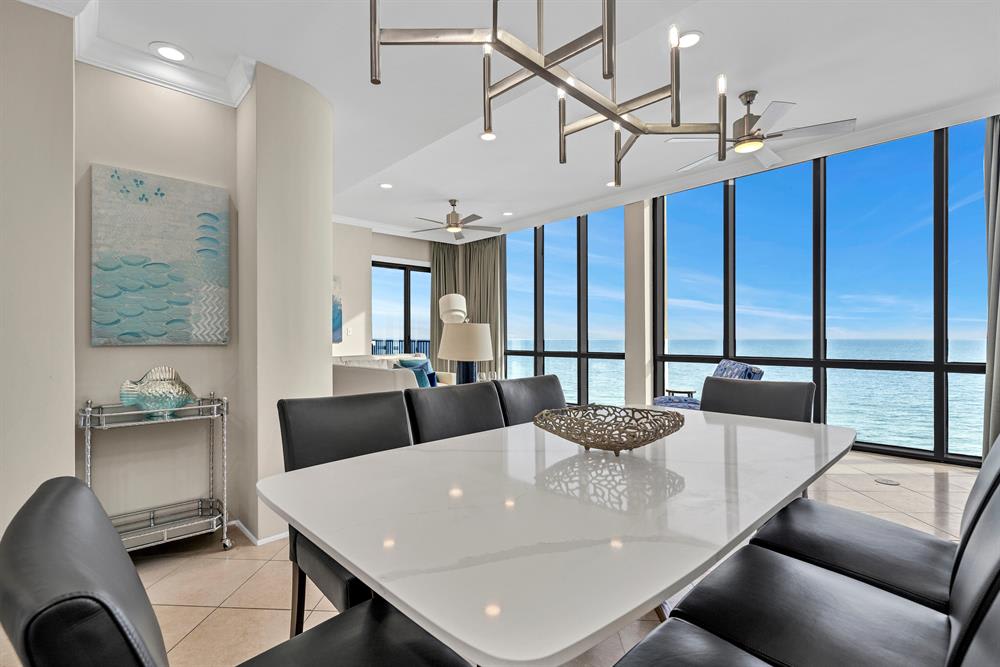 Beautiful dining area with comfortable seating for eight with great views!