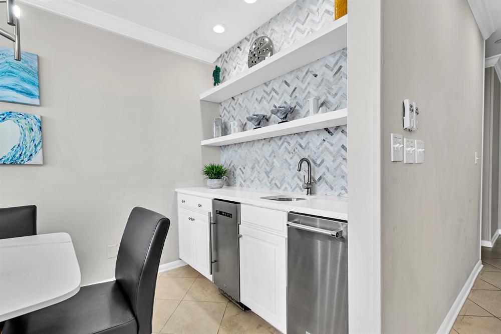 Make yourself at home with a wine fridge & ice maker at the convenient wet bar.