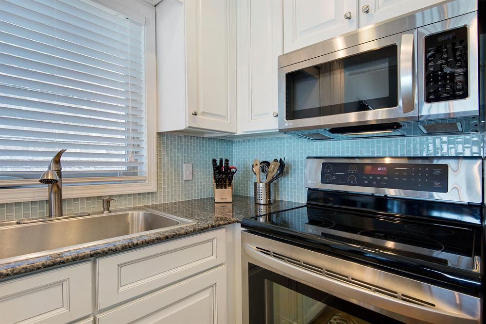Beautifully updated kitchen with extra large single sink.