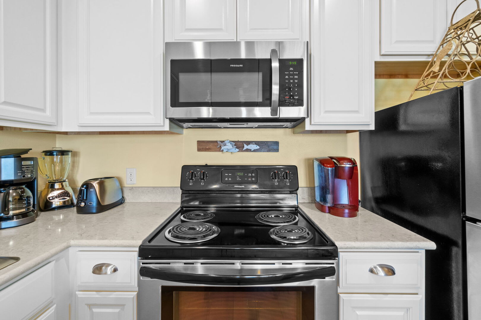 Stocked with cookware, dinnerware, and small appliances-everything you need for your stay.