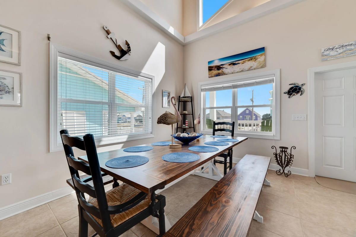 The large, stately dining table comfortably seats 10.