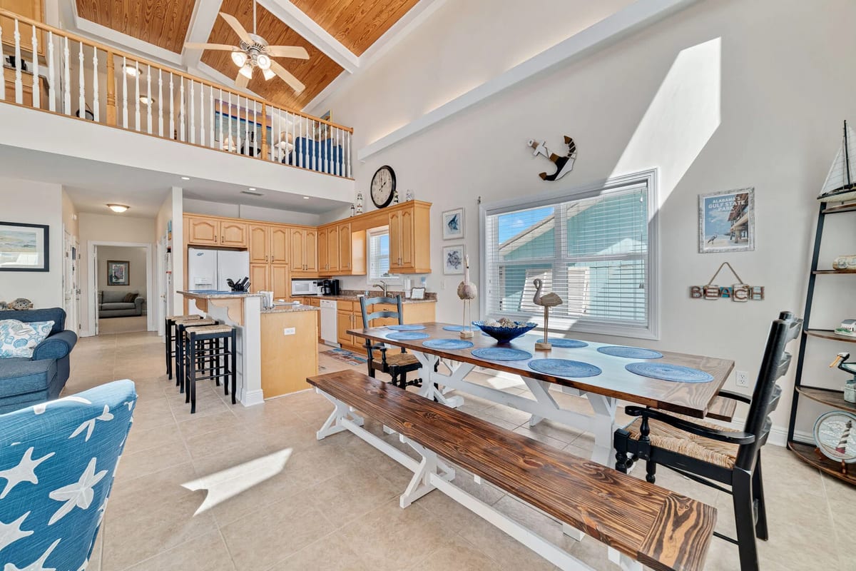 Adjacent to the kitchen, you'll find a charming dining area that comfortably seats ten, creating the perfect setting for memorable family meals.