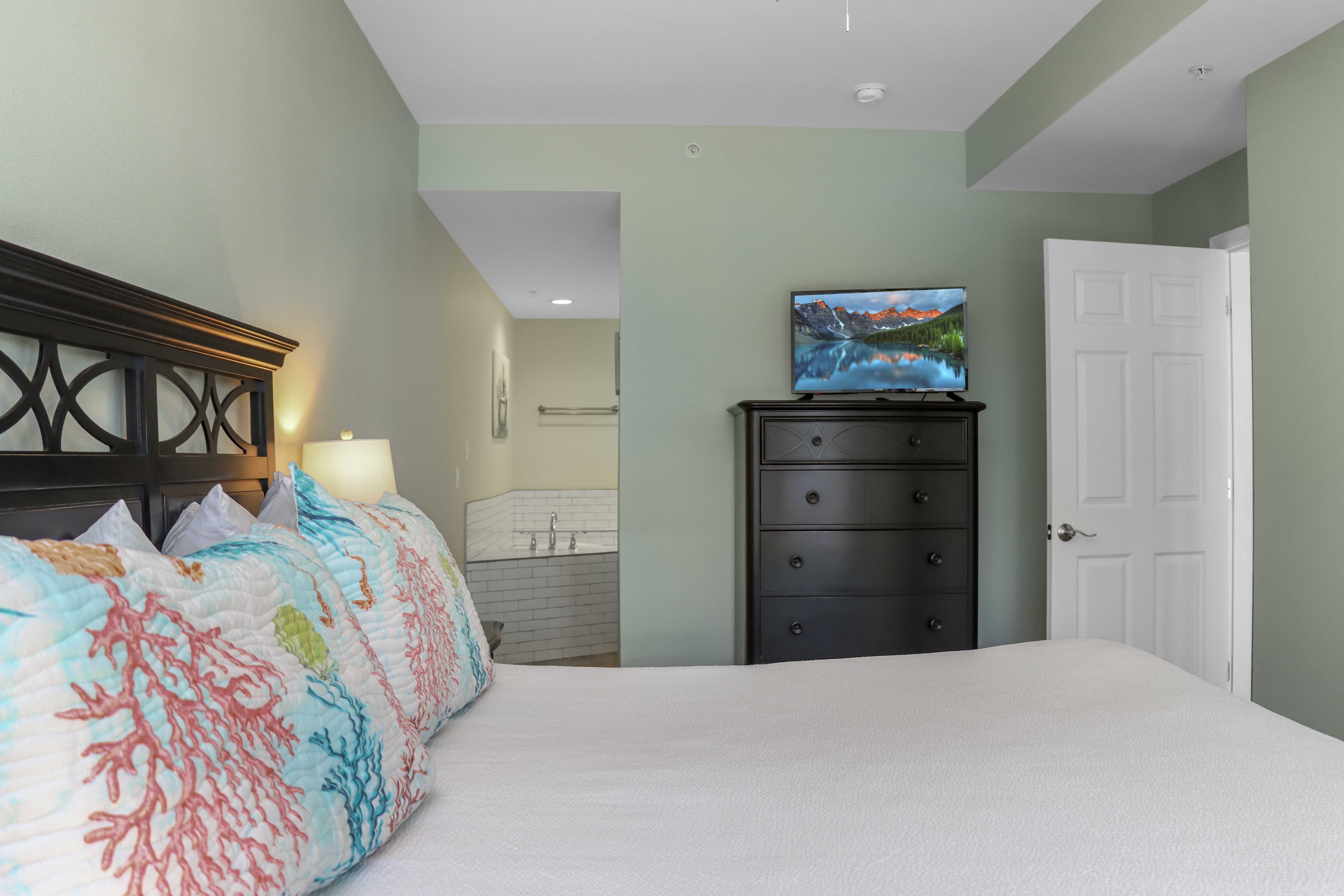 Bedroom 3 with TV and Master Bathroom