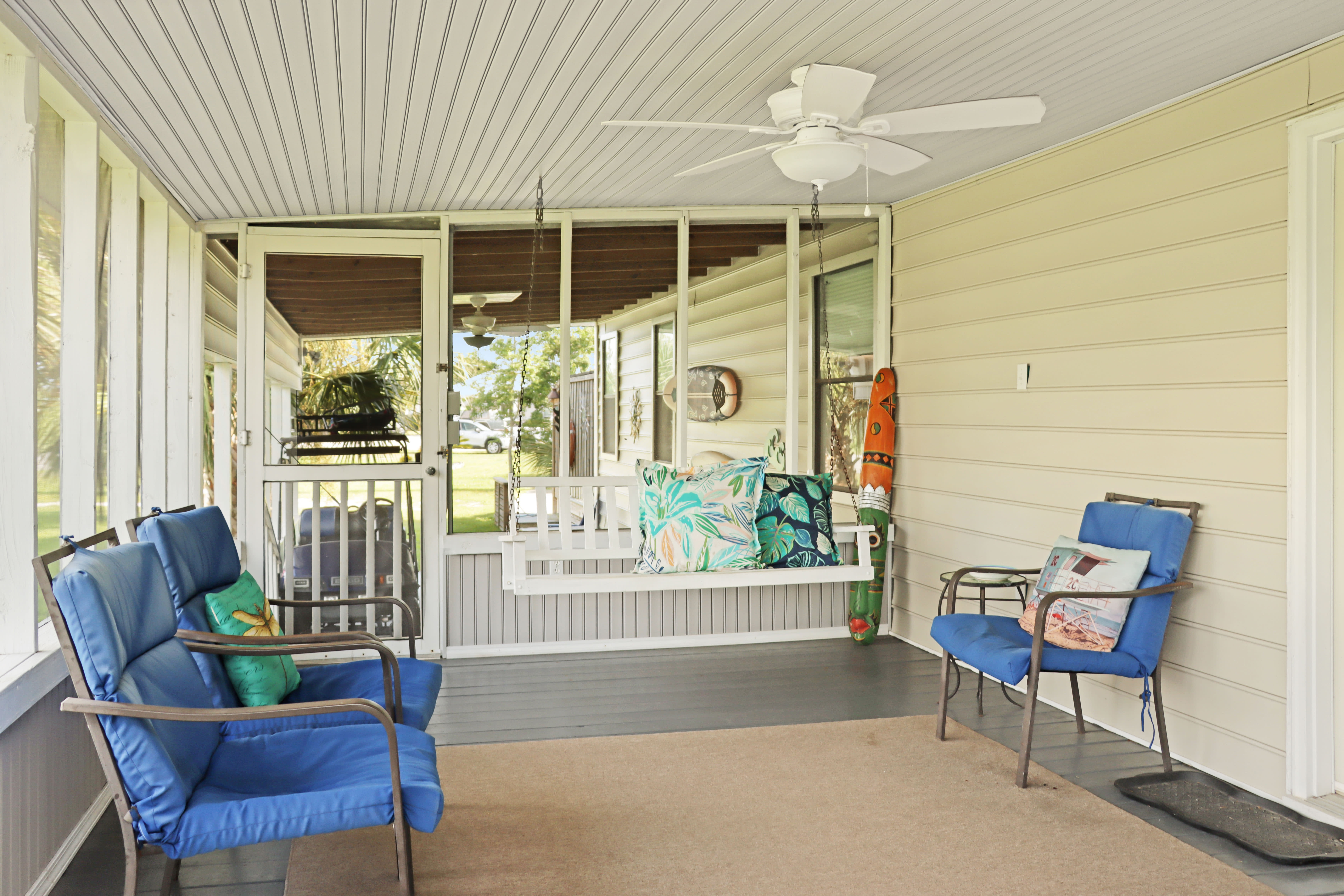 Screened Porch with Ceiling Fan and Swing
