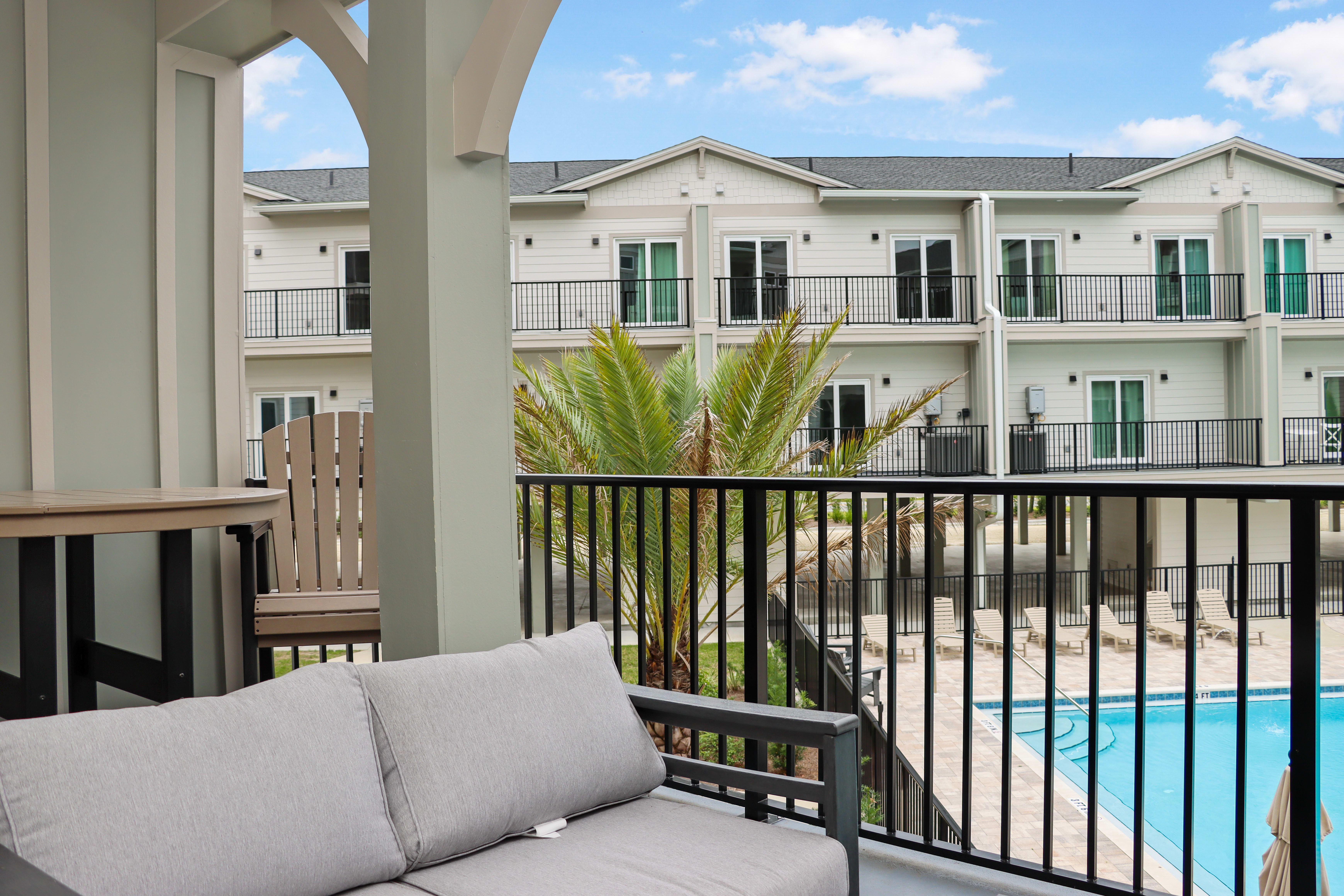 Furnished Deck with View of Pool