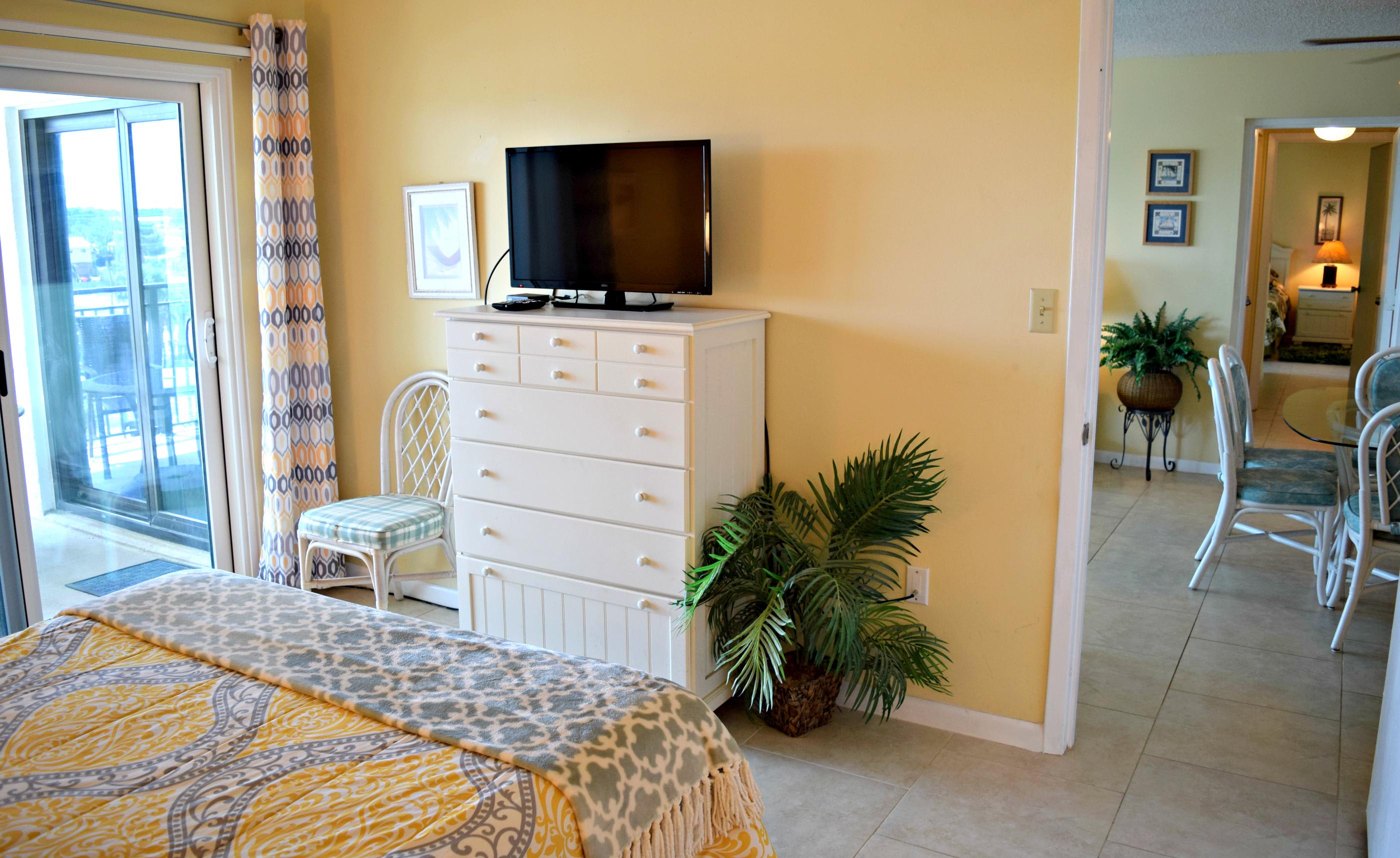 You can see the second master bedroom down the hallway.