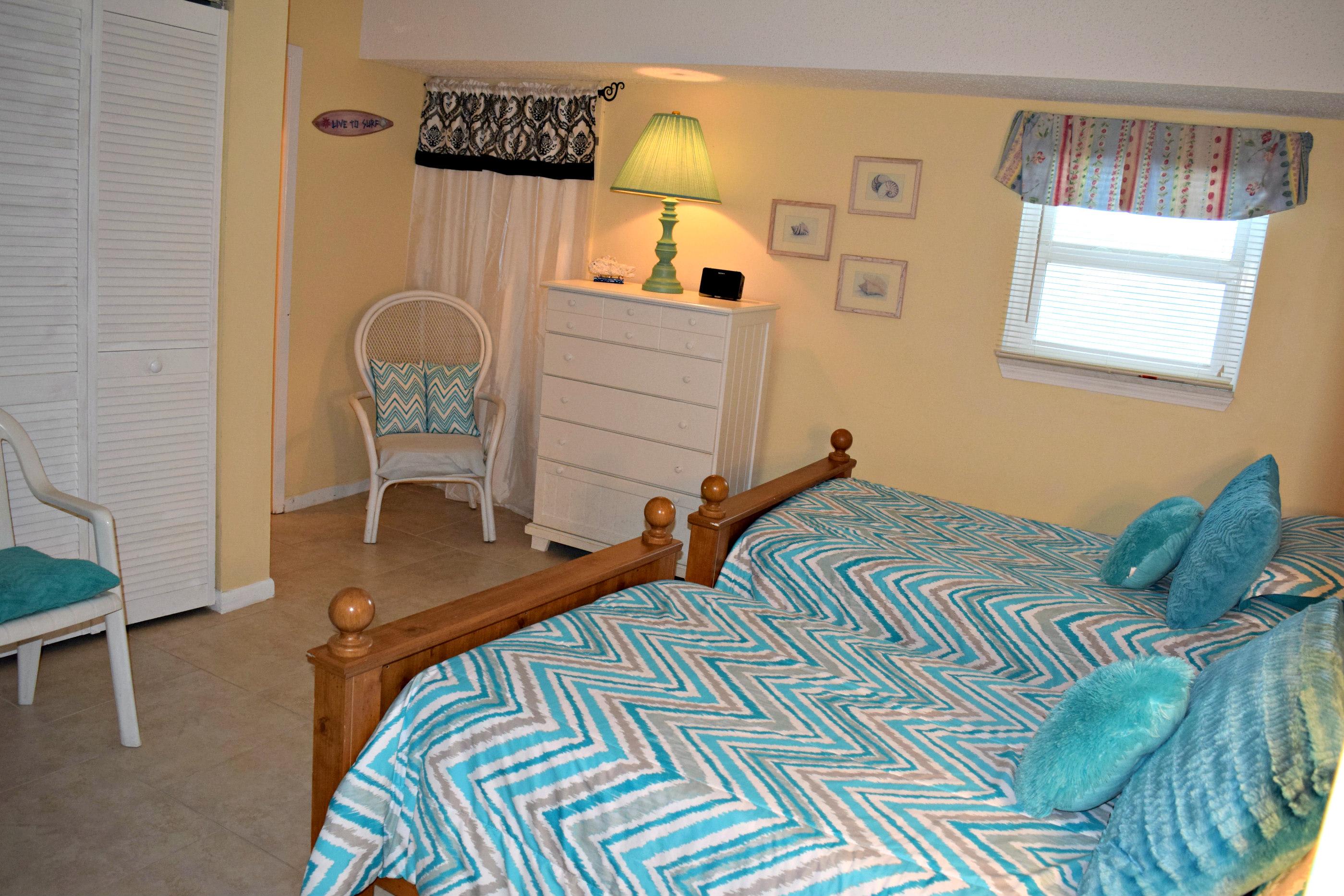 Third bedroom with two twin beds.