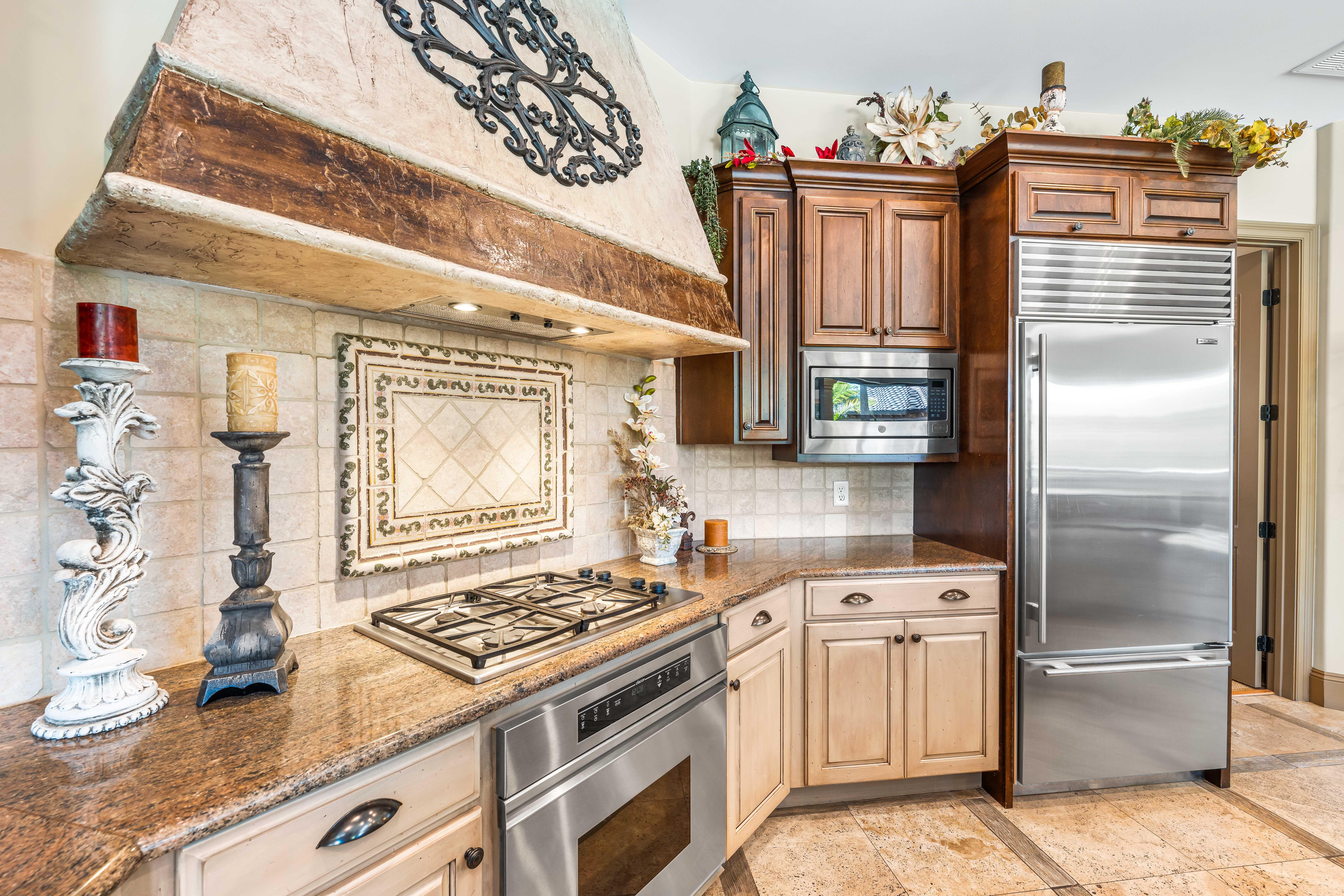 Granite countertops & Sub-Zero refrigerator