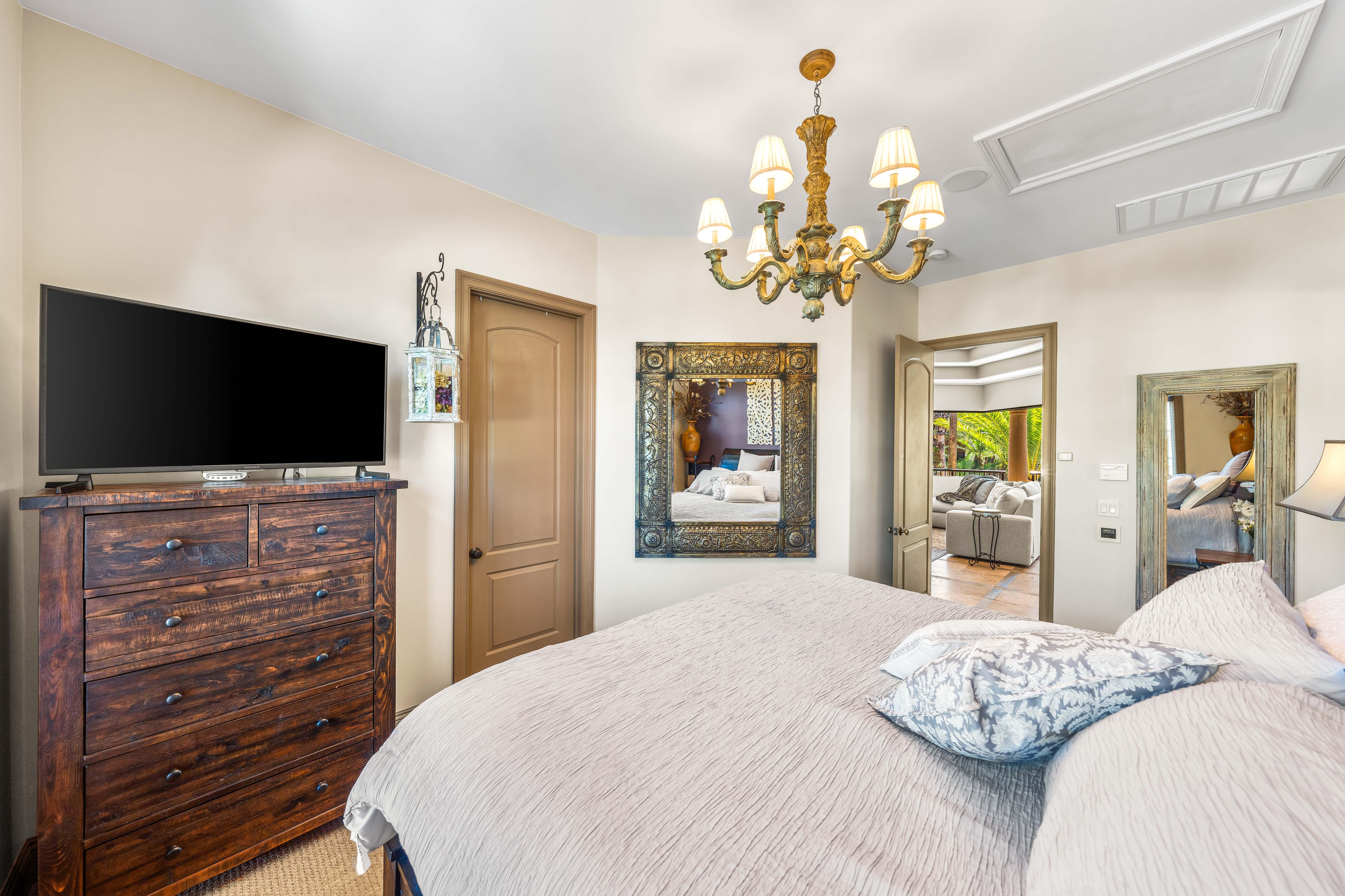 Plenty of storage with the large dresser and walk-in closet.