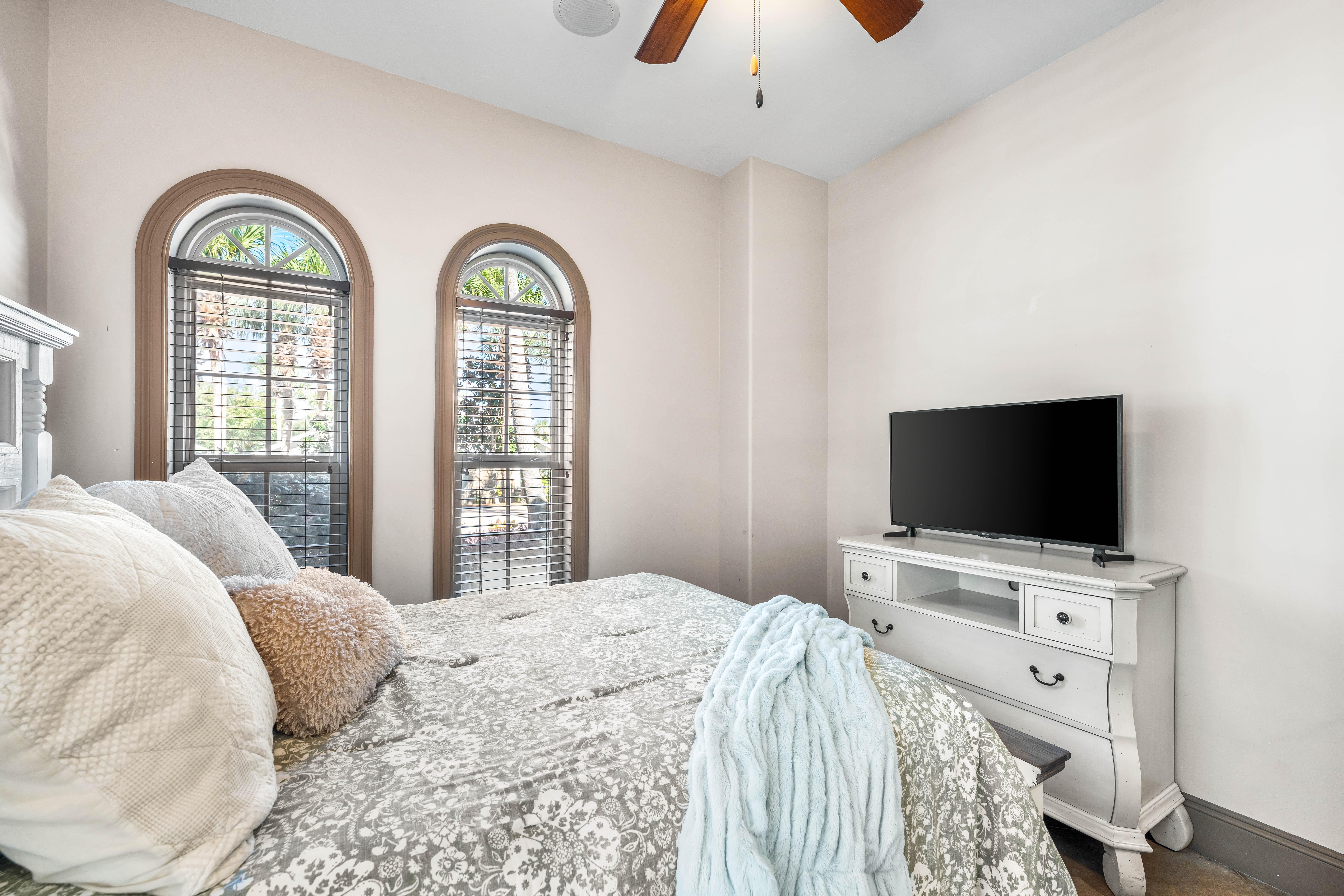 This queen bedroom has a 42" smart tv.