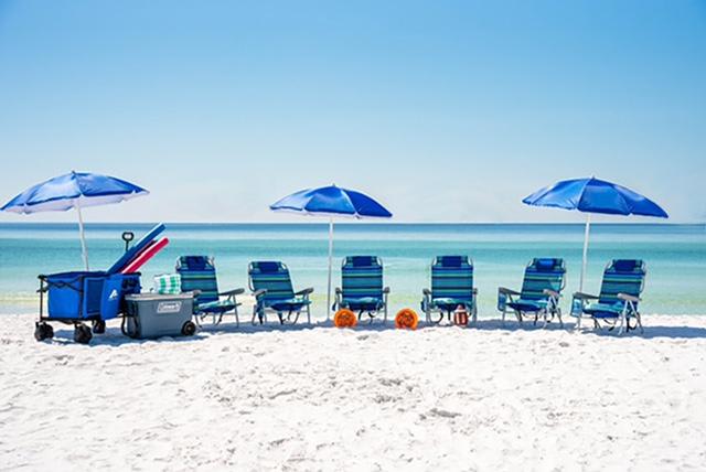 VACAY ESSENTIALS INCLUDED YEAR-ROUND: 6 Beach Chairs, 3 Umbrellas, Cooler & Beach Wagon