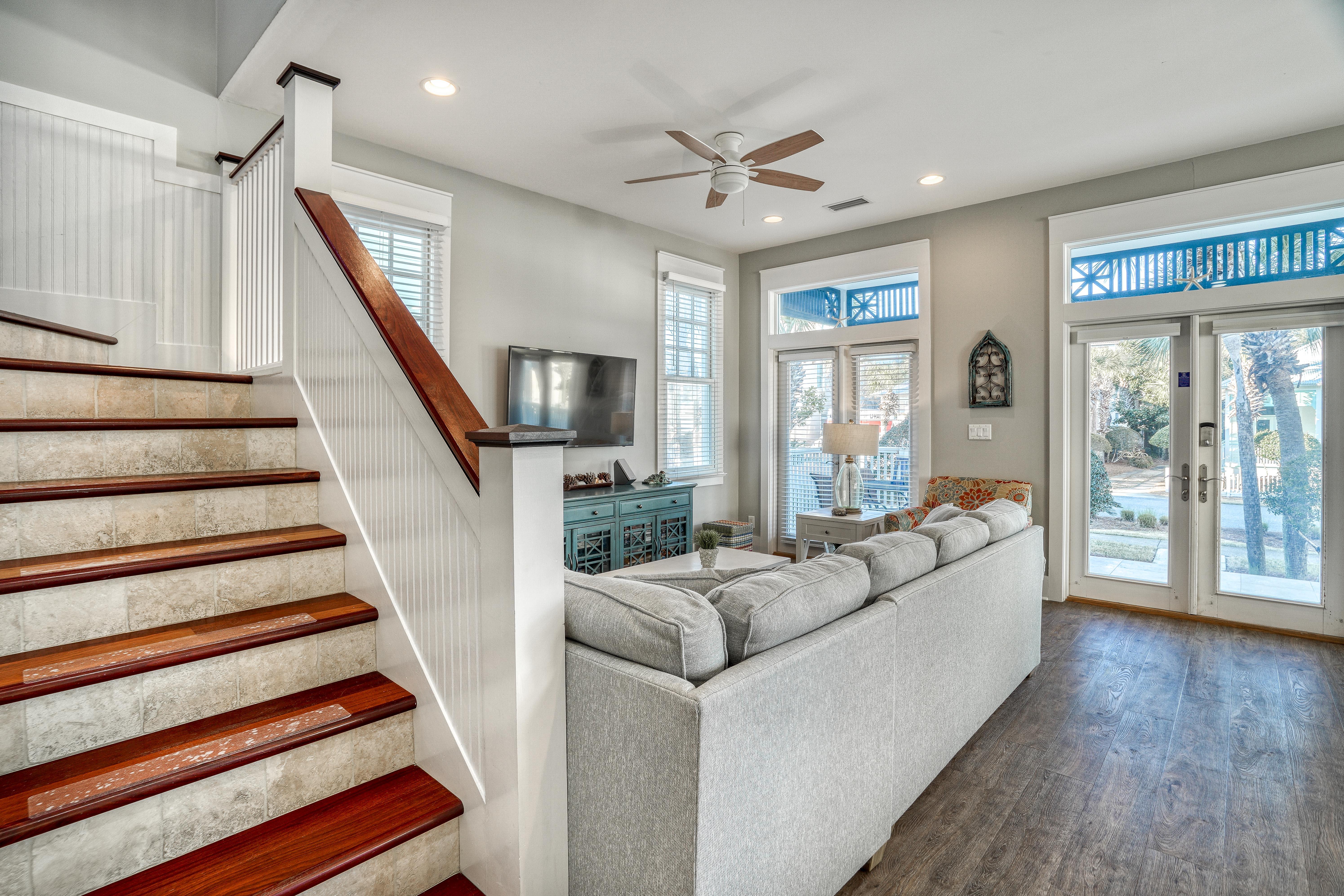 Stairs going up to your beachside primary retreat where you have the entire upper floor to yourselves!