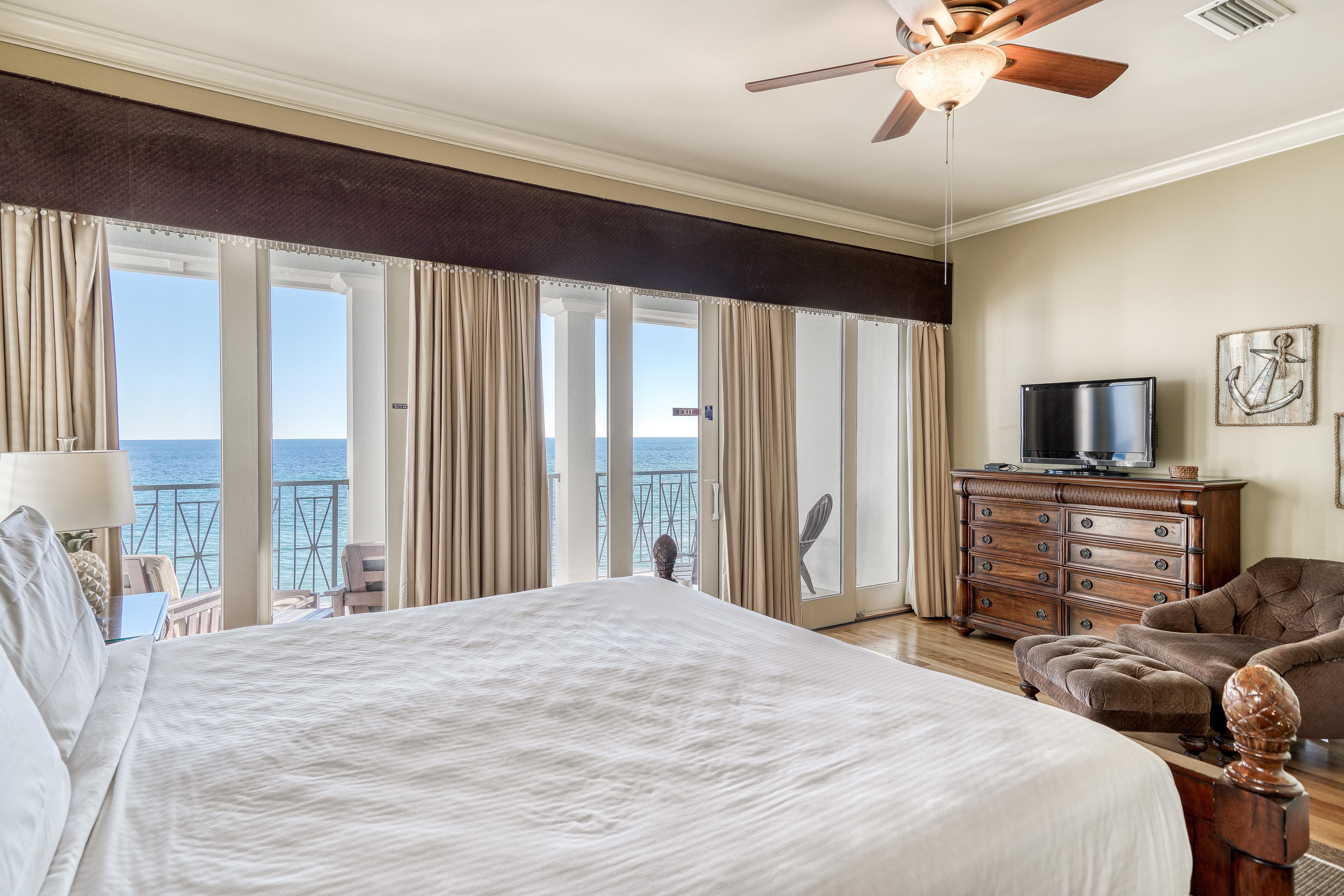 3rd Floor King Primary Bedroom, Ensuite Bathroom, TV  & Private Covered Beachfront Balcony with Seating