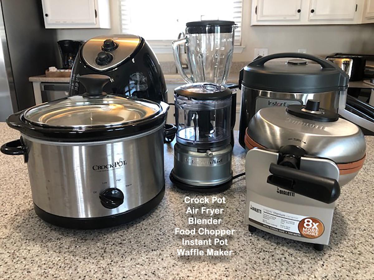 Crock  pot, air fryer, blender, toaster, food chopper, instant pot & waffle maker plus all the cookware you need!