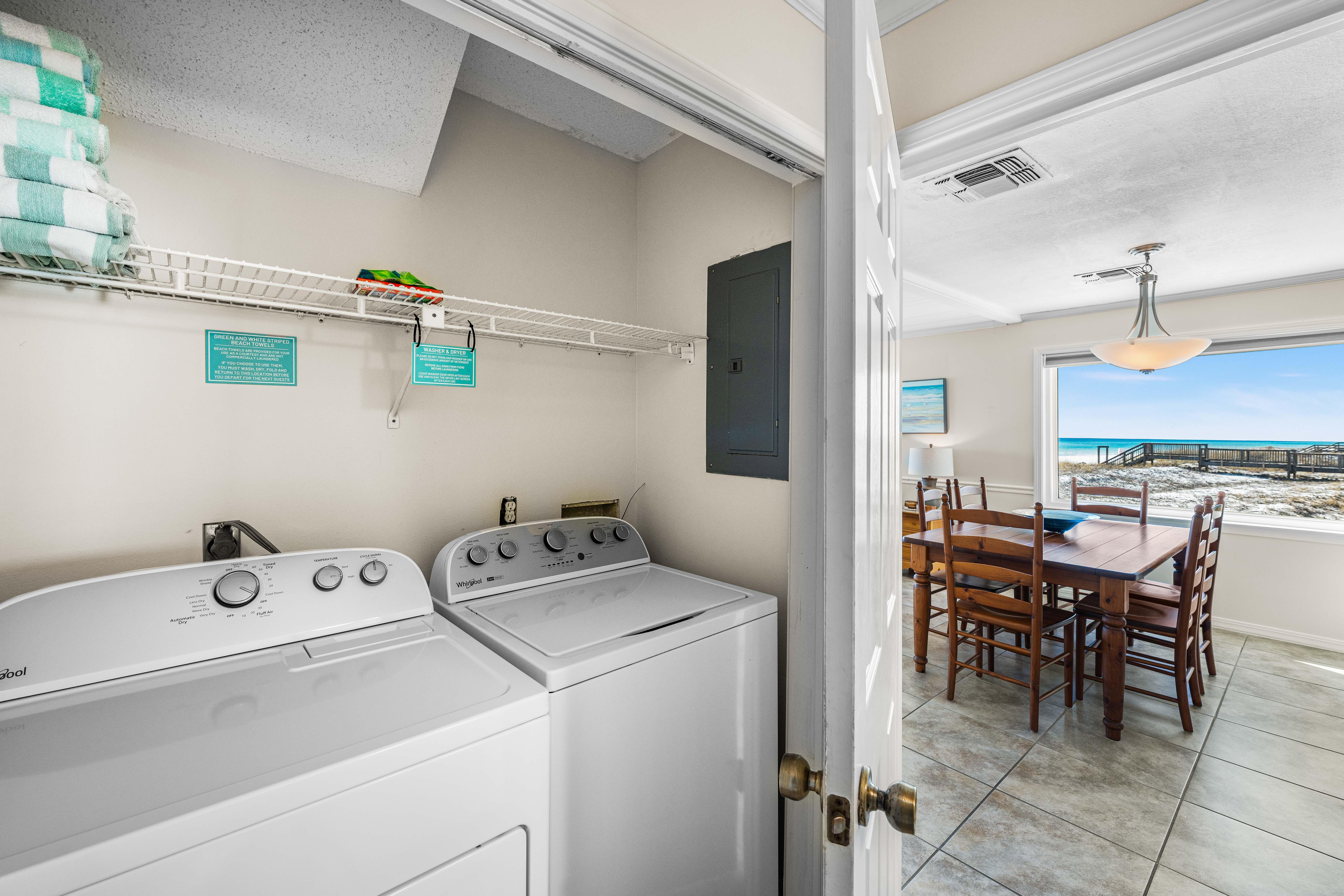 Full size washer and dryer with our Frangista green & white beach towels