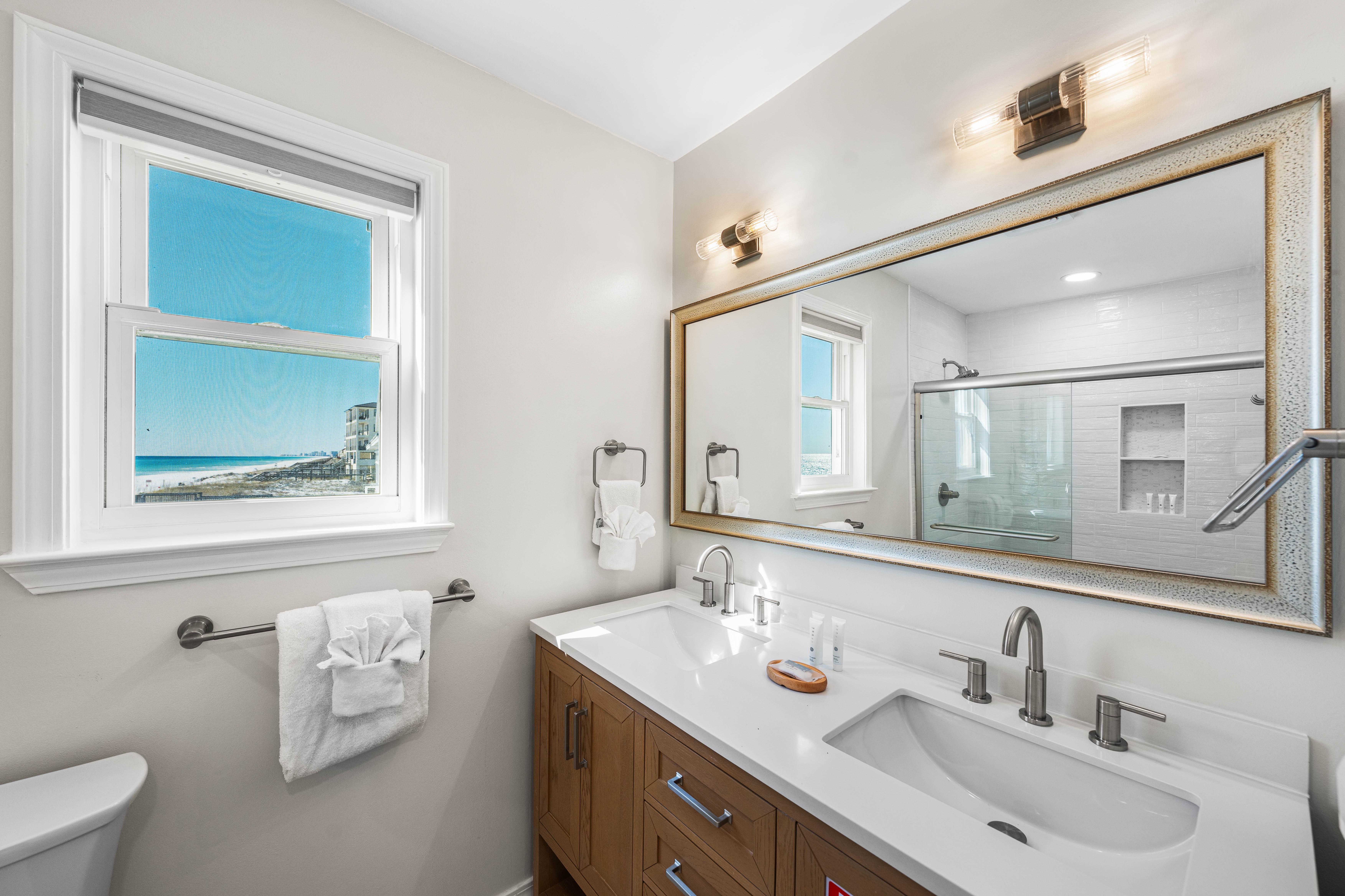 Primary ensuite full bathroom  with a walk-in shower.