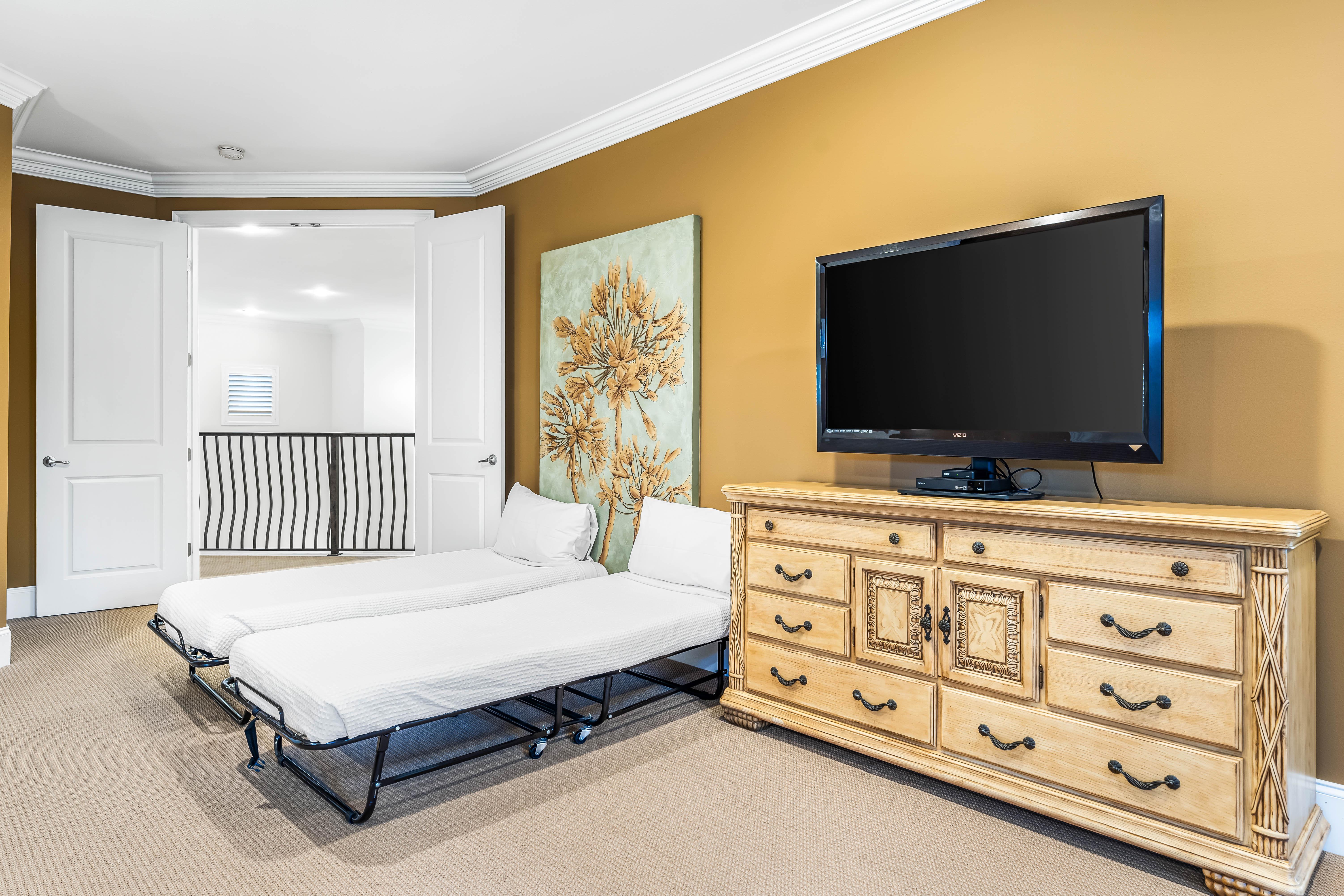 Second Floor Primary Bedroom- Twin Cots are in the closet and can be used anywhere in the home