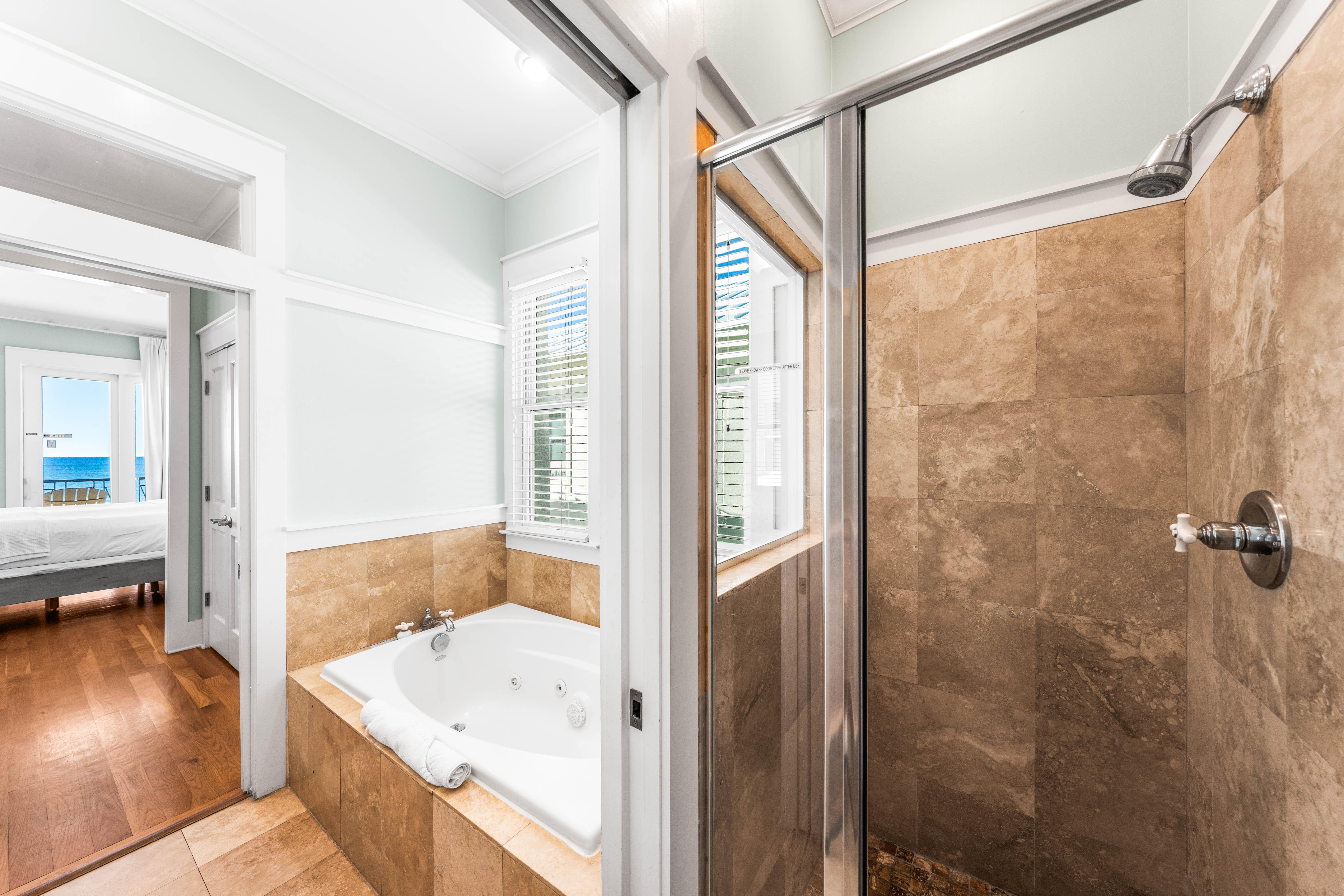 Walk-in shower in the primary ensuite bathroom.