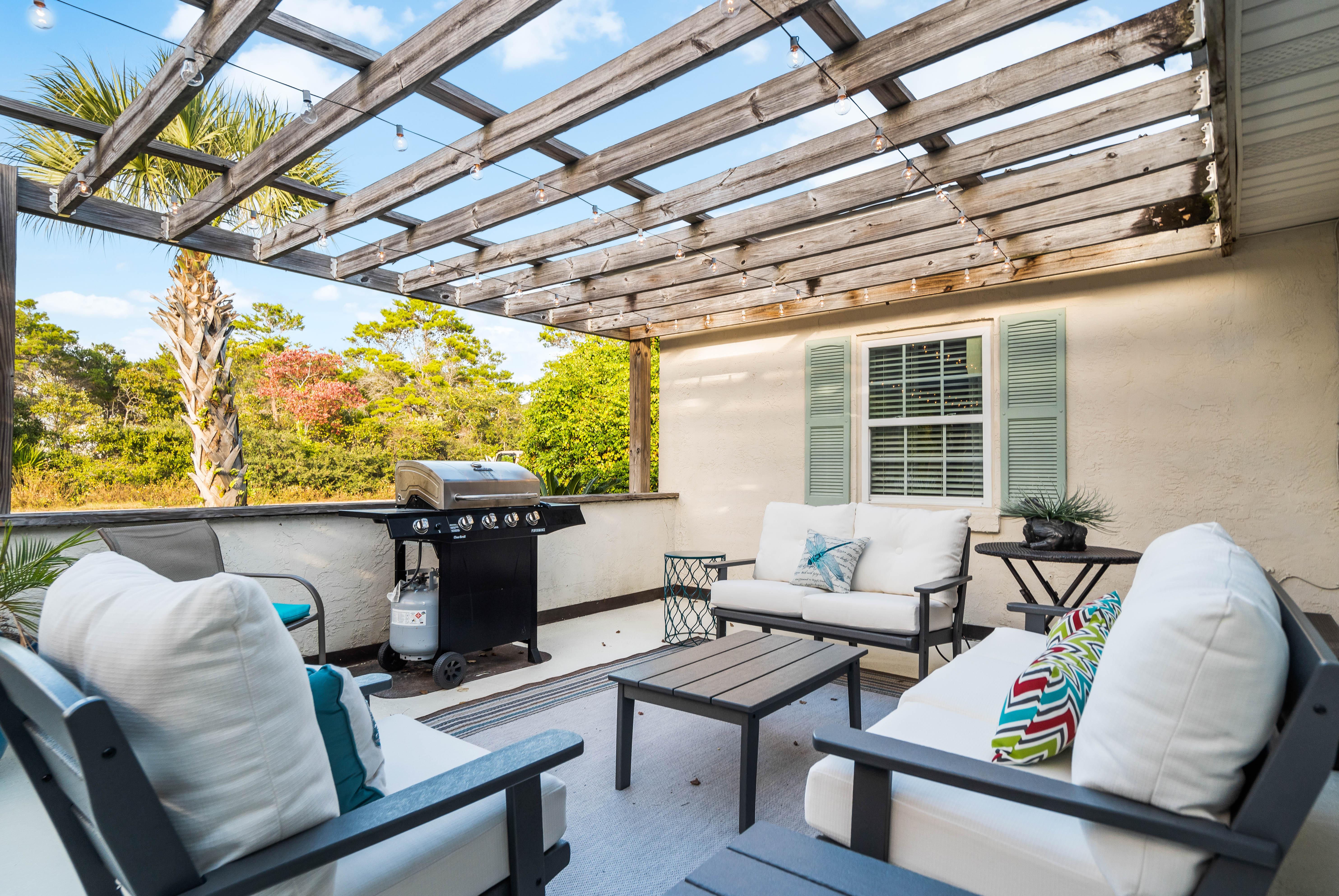 Front Porch with Plenty of Comfortable Seating, Gas Grill and Outdoor Dining Under the Cafe Lights