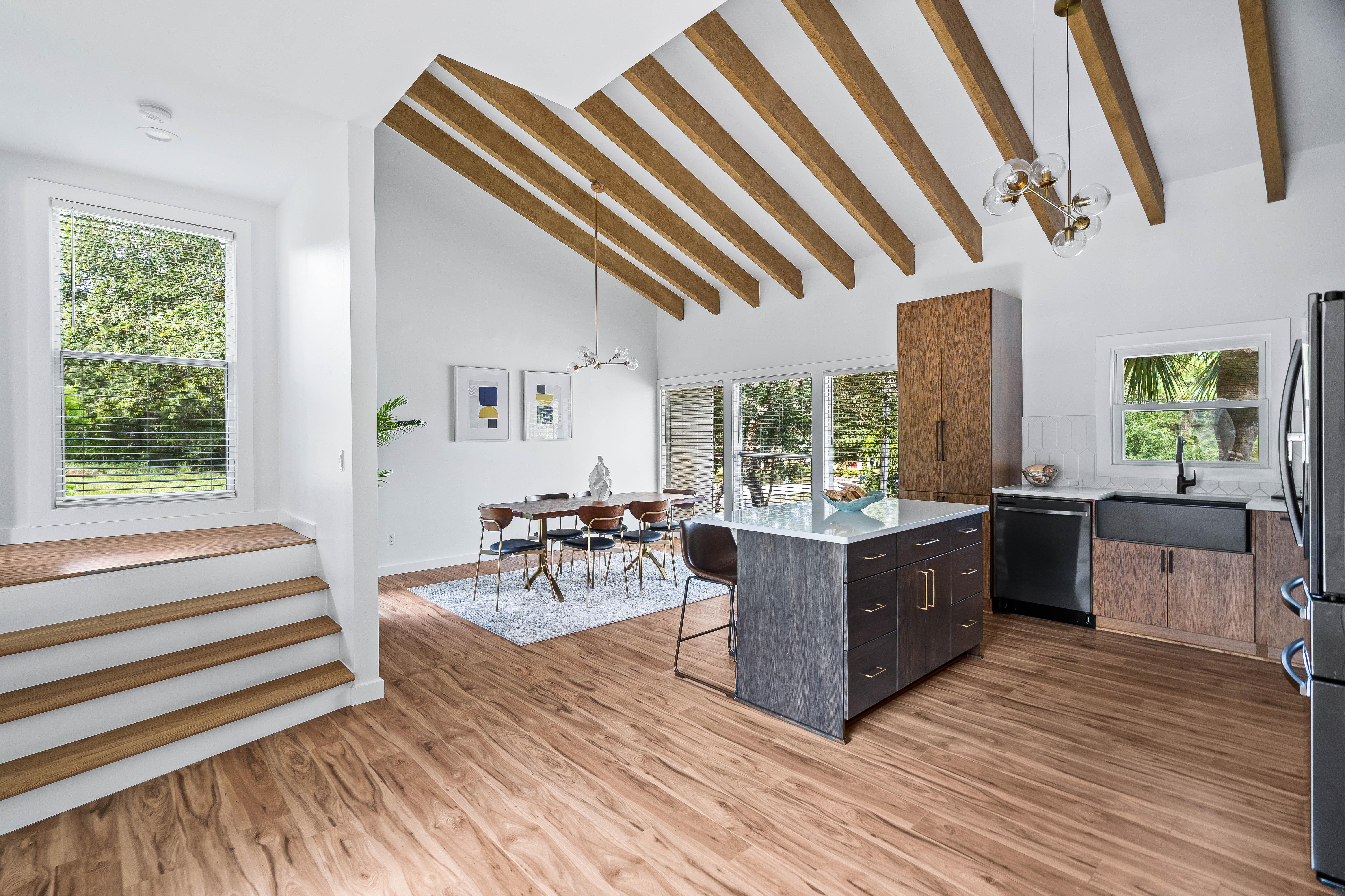 Stairs leading to the primary king bedroom and bunk room.