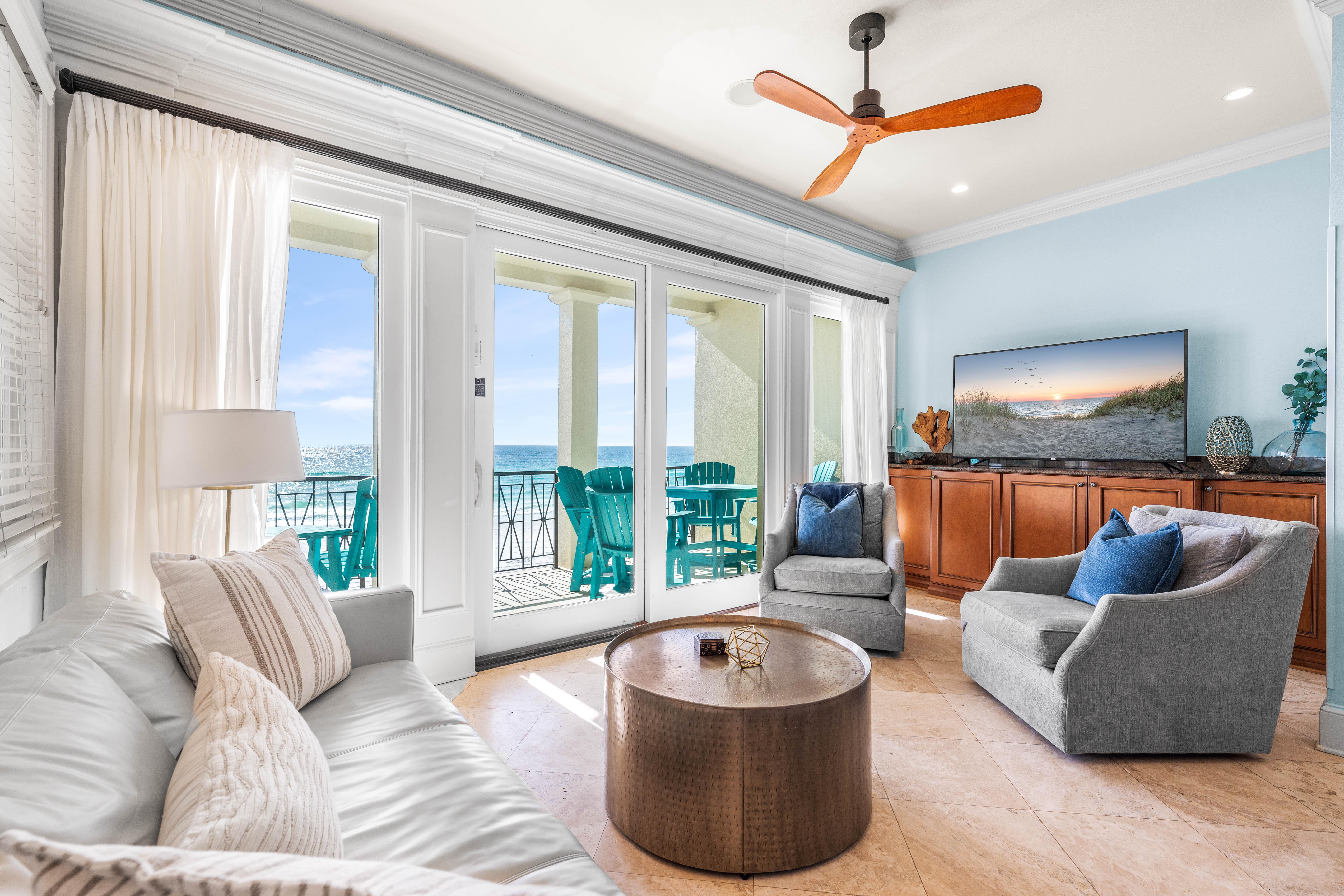 Elegant Furnishings Continue in the 2nd Floor Living/Dining Area with 65" Smart TV with Cable, Dining Table for 6 & Bar Seating for 2.  Covered balcony with outdoor seating and dining table for 6 - all with Gulf Views!