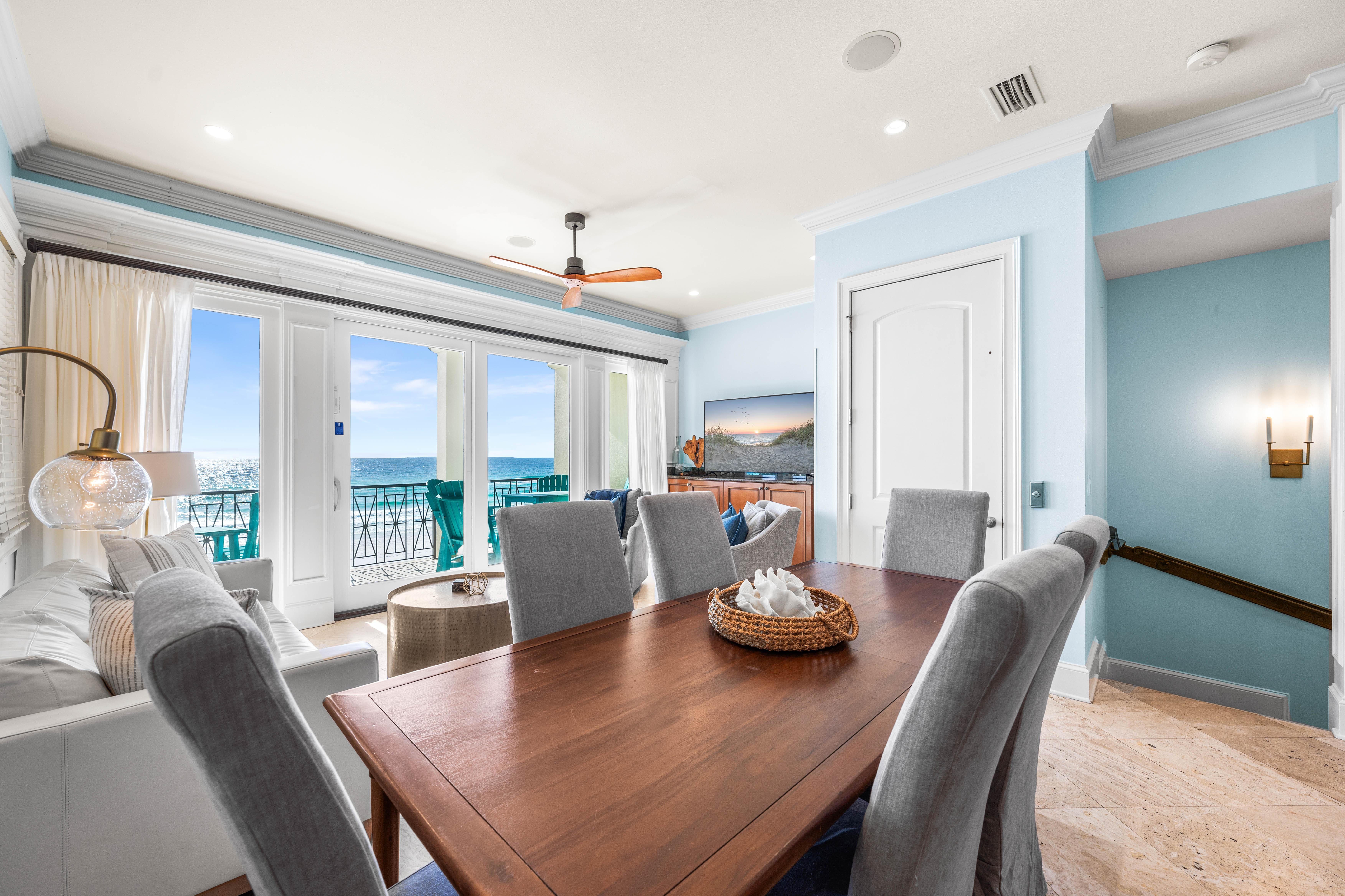 Elevator Access in the 2nd Floor Living/Dining Area with 65" Smart TV with Cable, Dining Table for 6 & Bar Seating for 2.  Covered balcony with outdoor seating and dining table for 6 - all with Gulf Views!