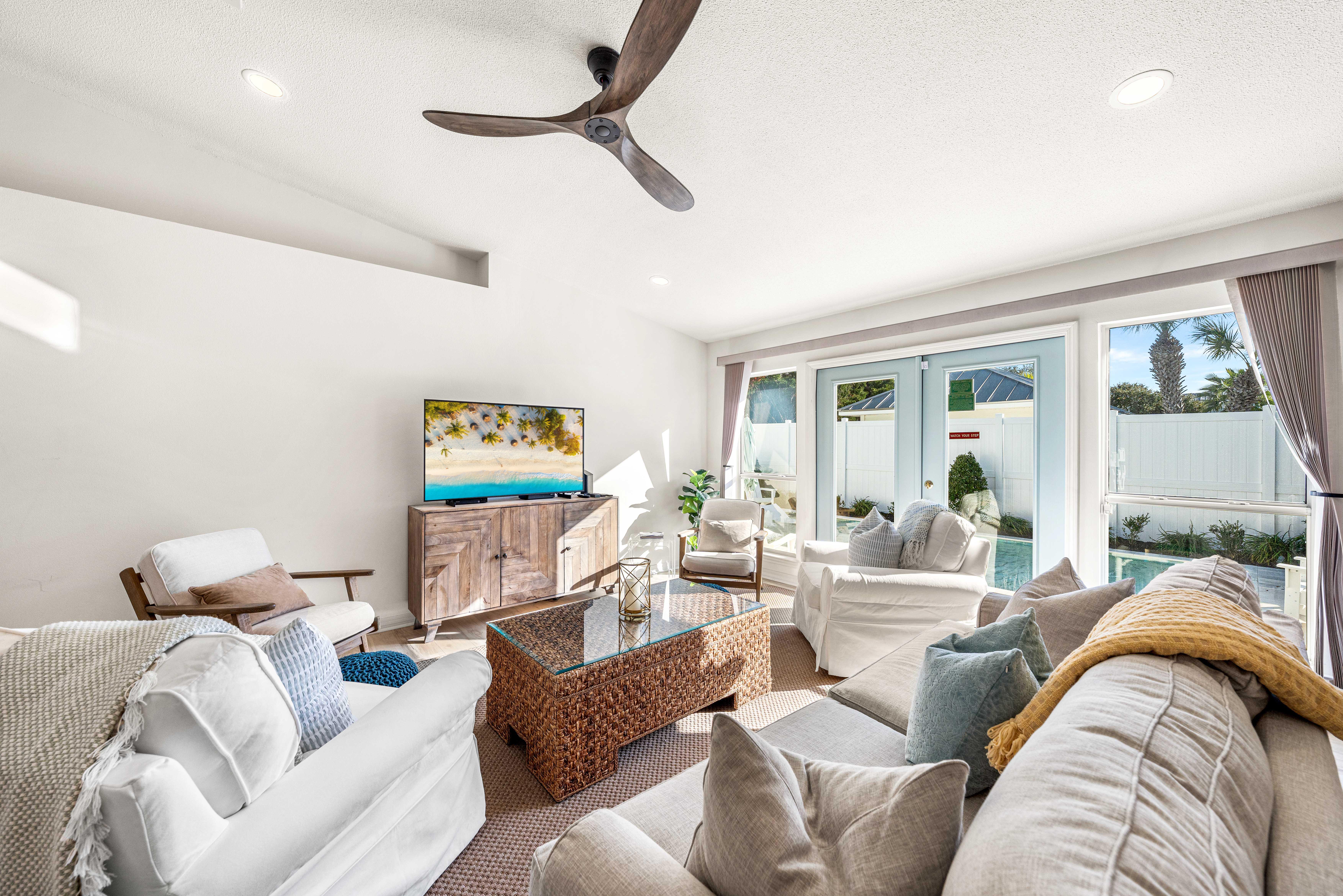 Beautiful Designer Remodeled Home!! Plenty of Seating for 8, Pool View From this Living Room and the Dining Area. 55" Smart TV with Cable.