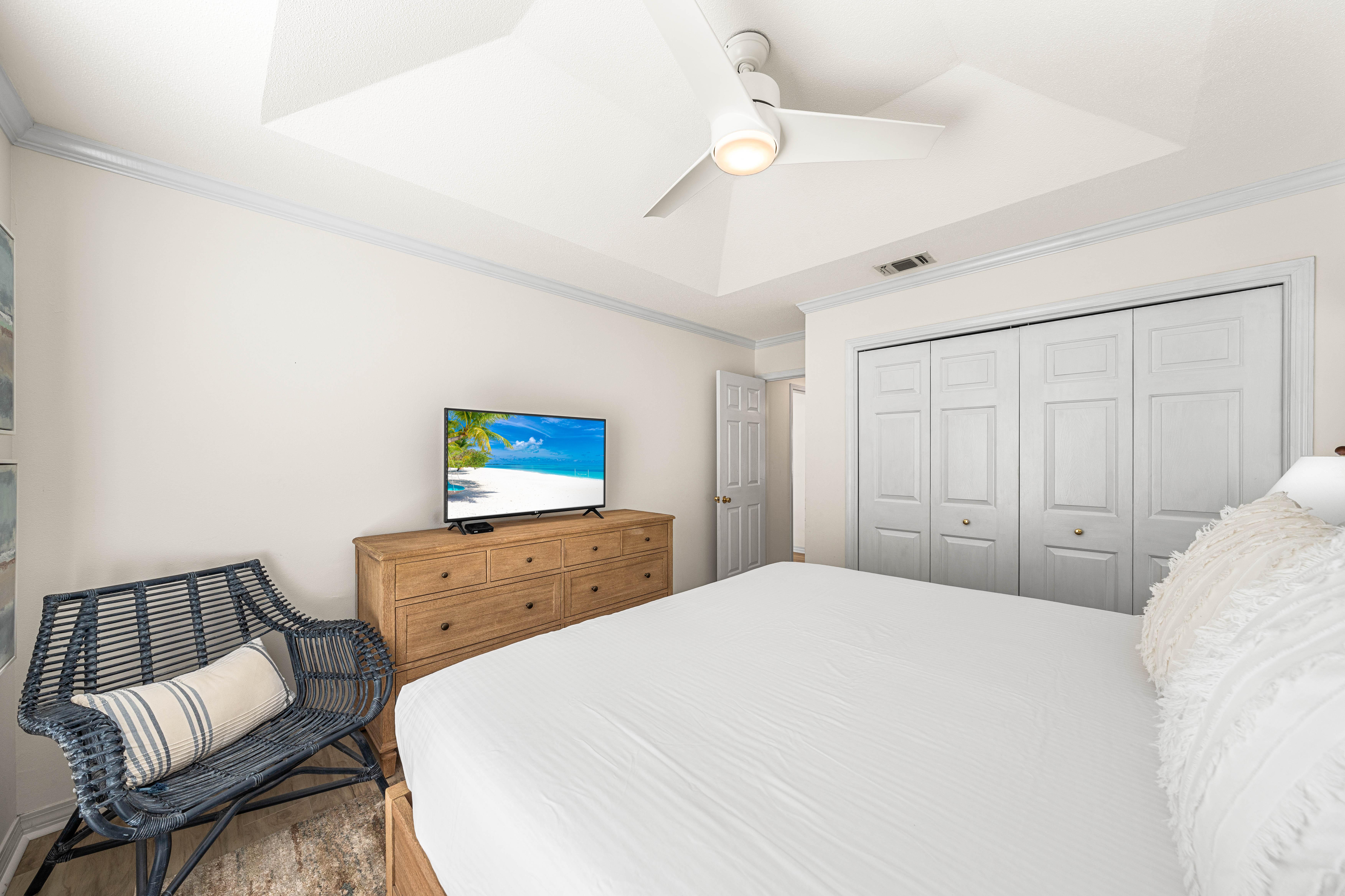 King Bedroom with a Pool View, Large Dresser, Night Stands for Placing your Favorite Book and a Large Closet!!  42" Cable TV and Additional Seating