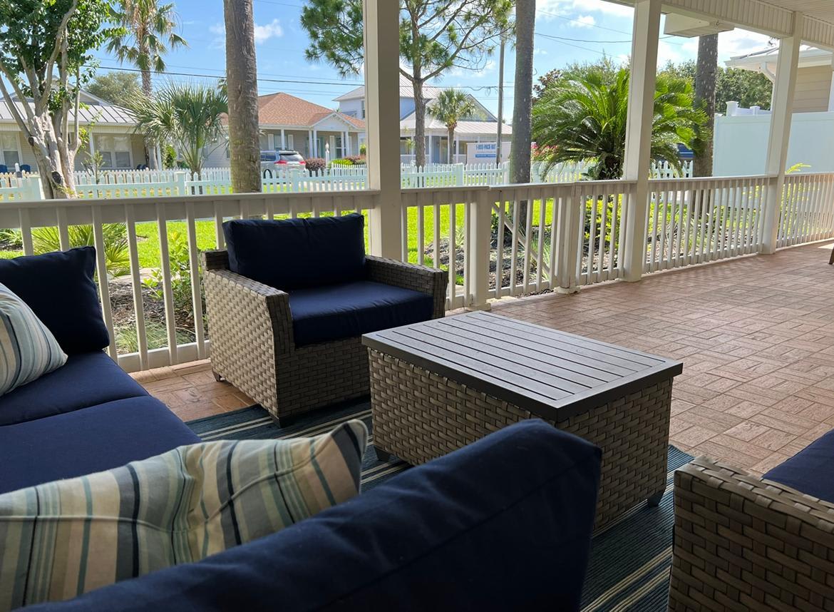 Large Covered Front Porch with Plenty of Seating