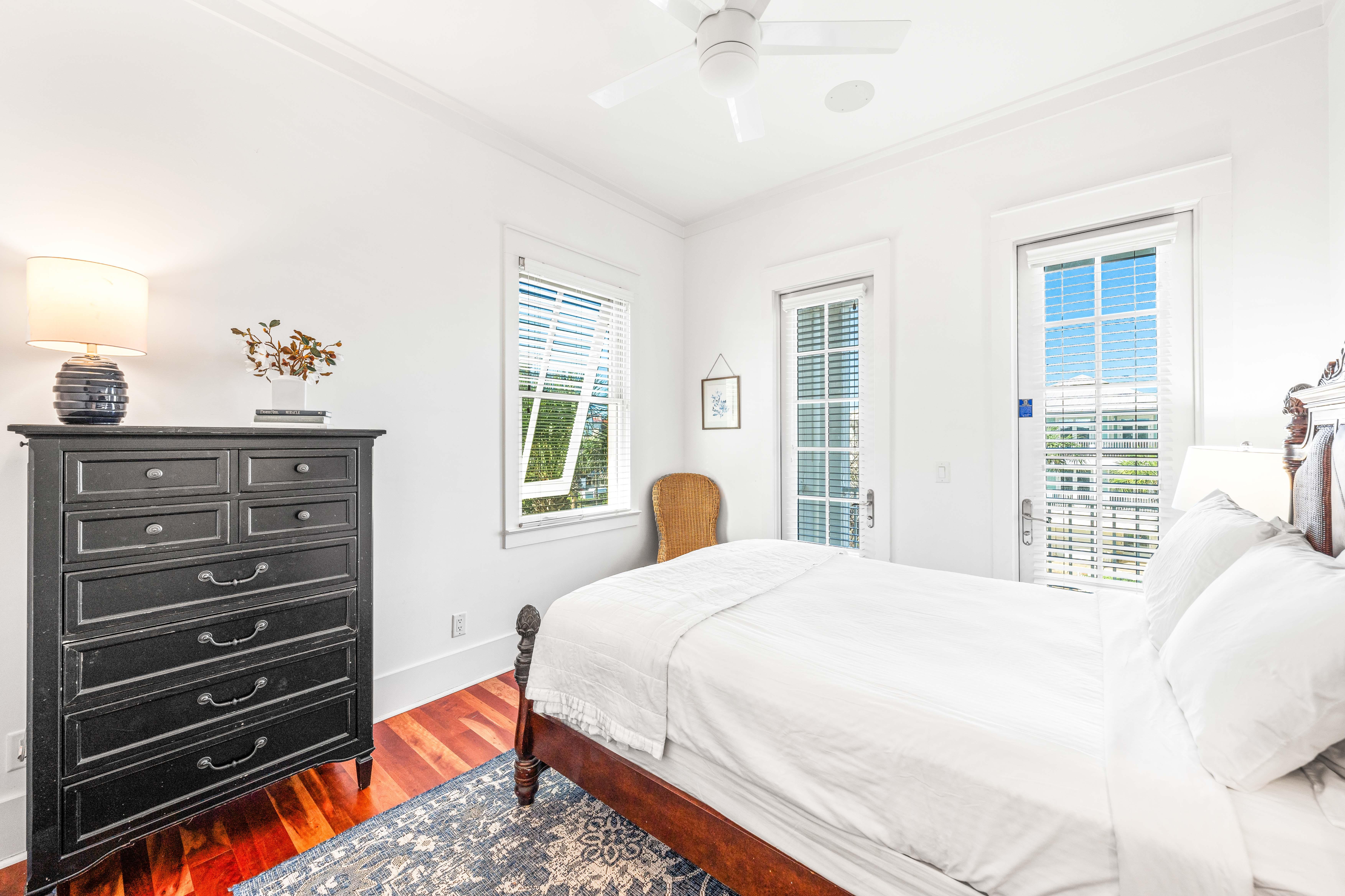 3rd floor northwest bedroom with queen bed, tv  & ensuite bathroom!  Balcony overlooking the Frangista Beach community.