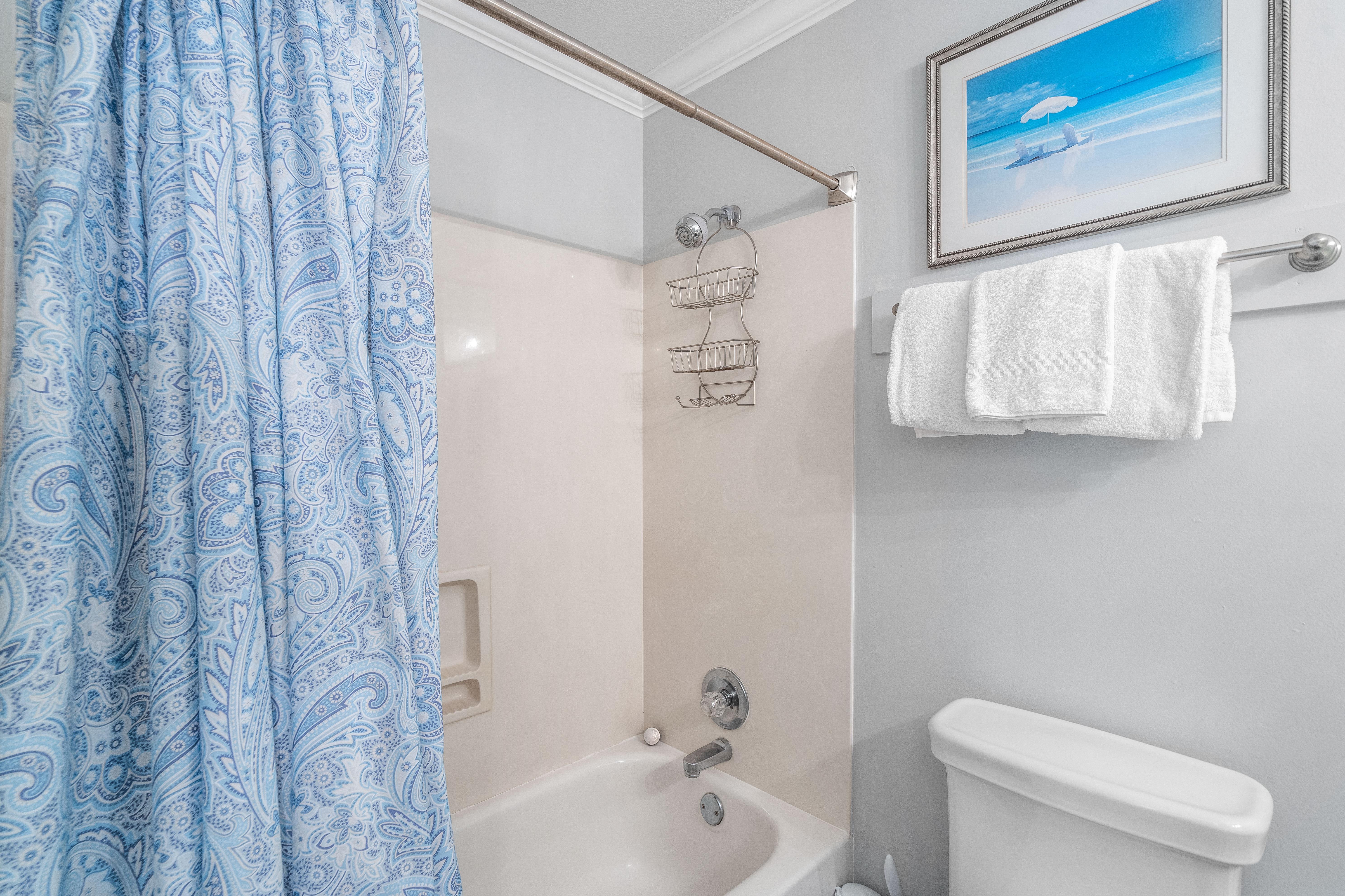 Ensuite bathroom for bedroom #3 with shower/bathtub combination.