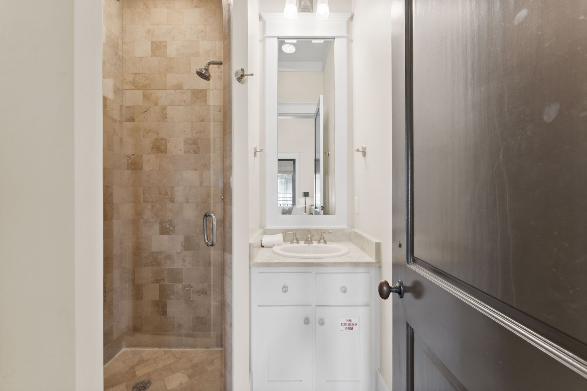 Bathroom - Equipped with a Walk In Shower & Single Vanity