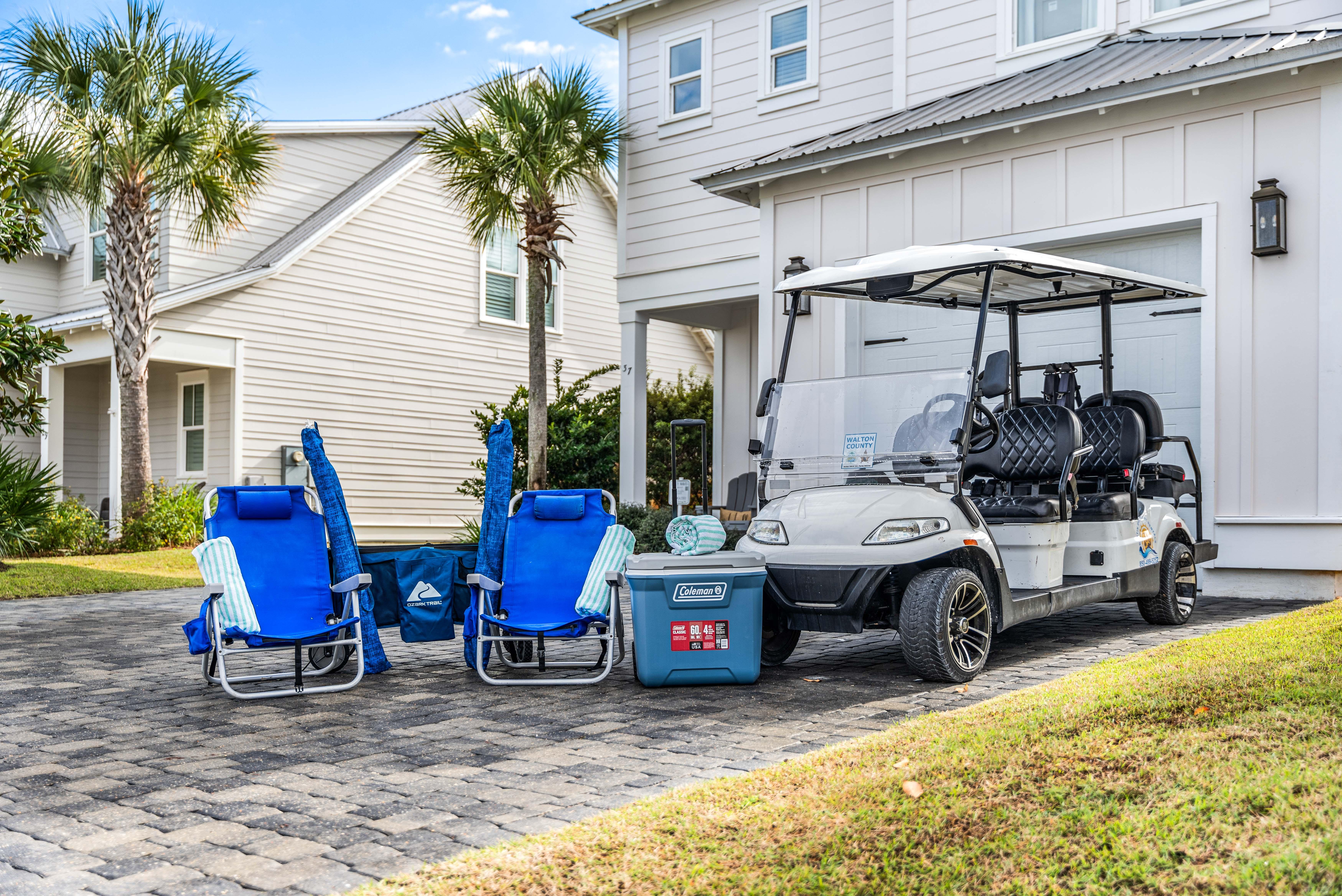 6 Seater Golf Cart, Beach Wagon, 62 Quart Beach Cooler,6 Additional Back Pack beach Chairs and 3 Umbrellas for your use YEAR-ROUND!!