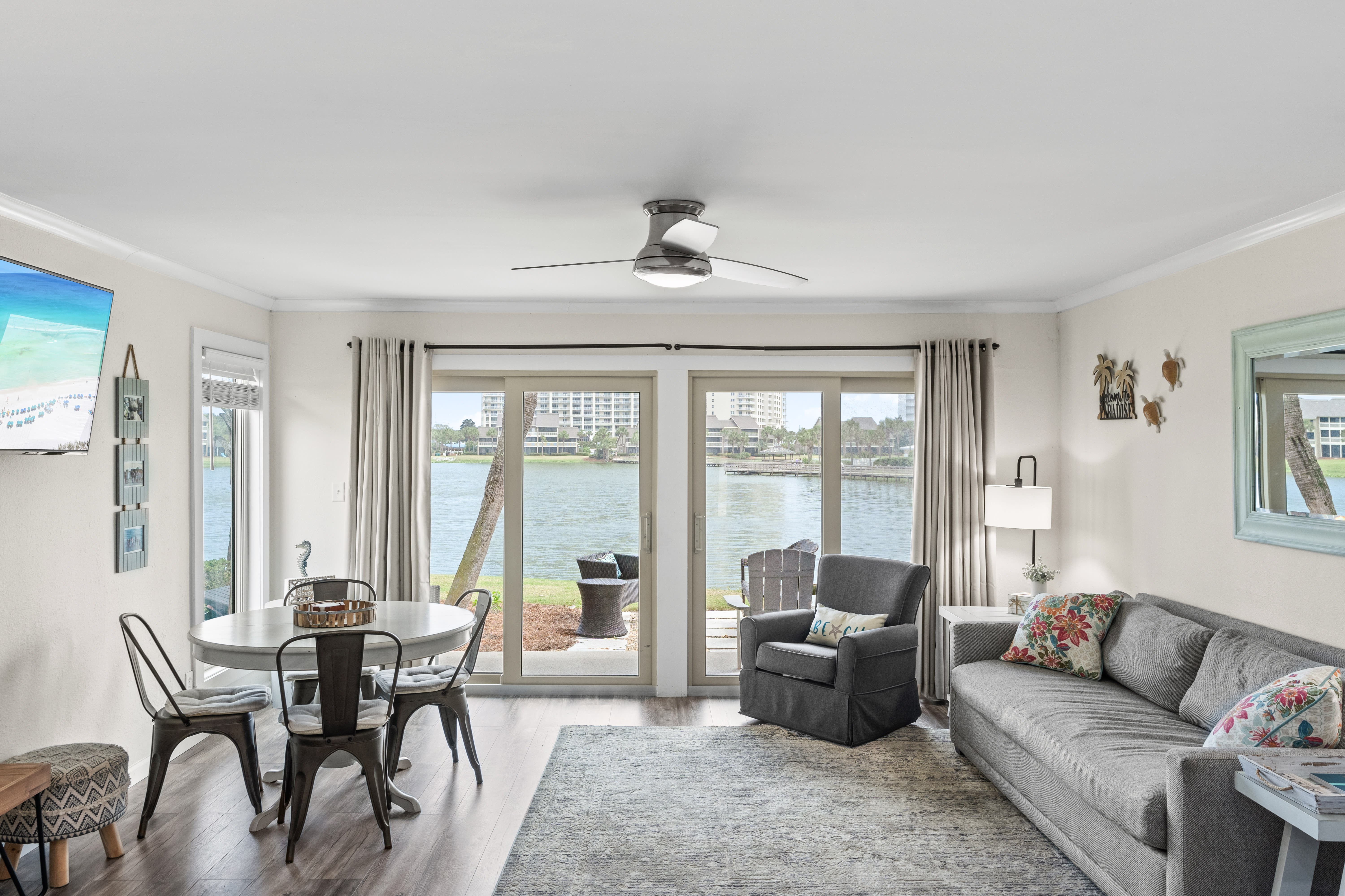Relax in your bright living space with stunning waterfront views right outside your door.