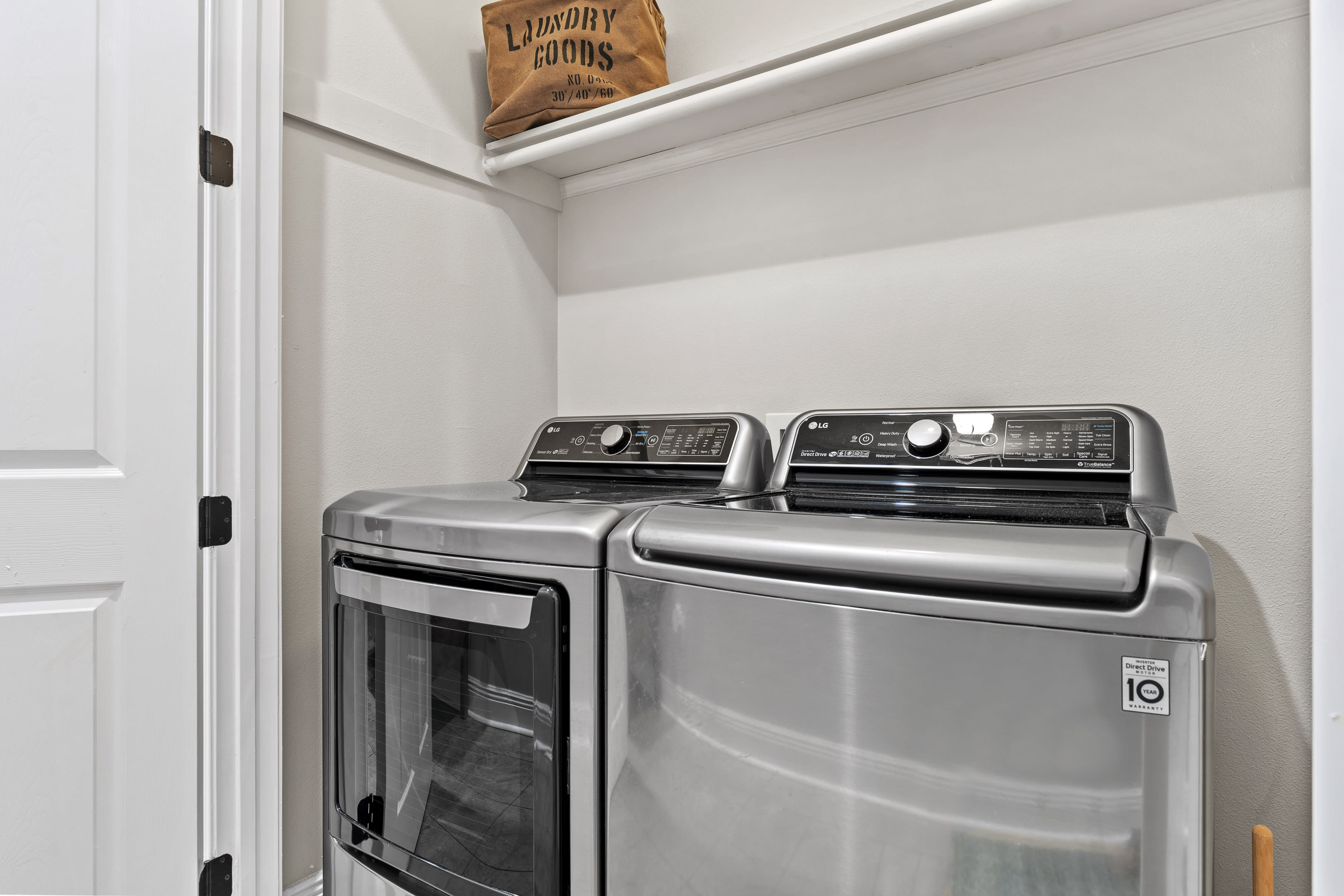 Laundry area with full size washer and dryer