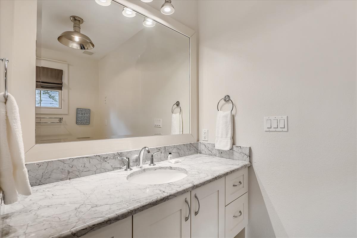 Guest En Suite - Featuring a Tub-Shower Combo & Single Vanity