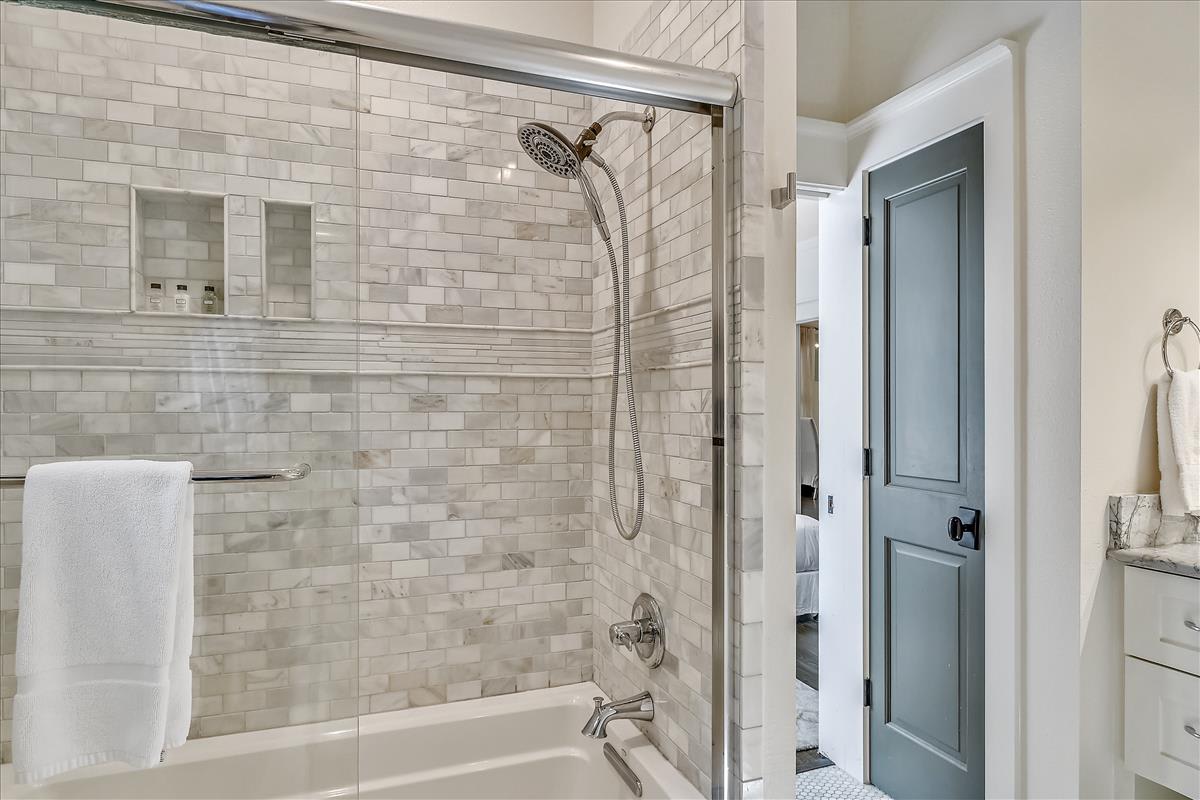 Guest Bathroom - Equipped with a Tub-Shower Combo & TV