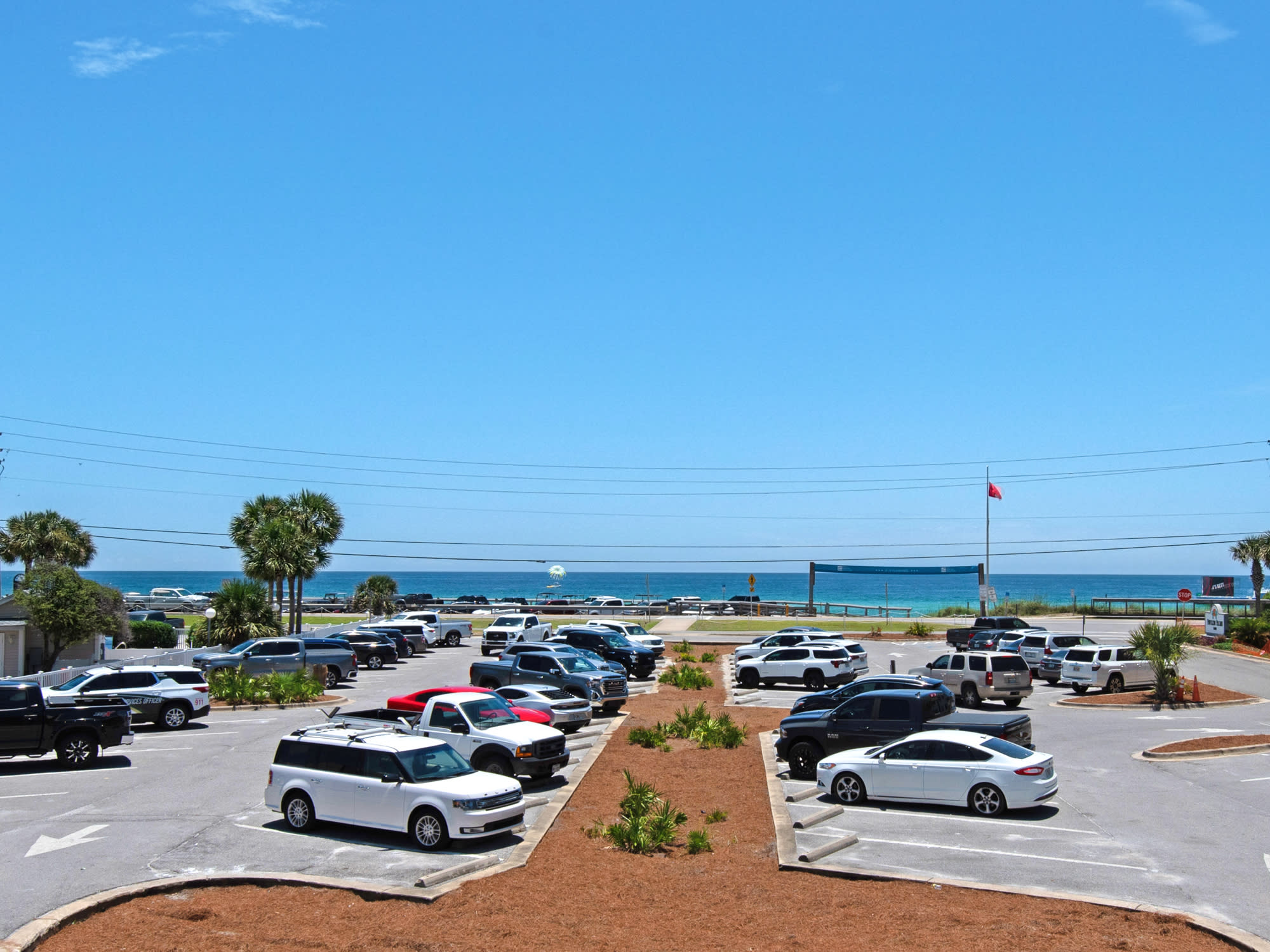 Watch the palm trees sway under the bright, sunny sky as the Gulf stretches out before you in dazzling shades of green and blue