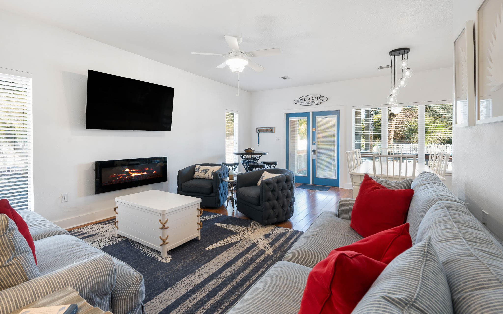 Sink into plush seating by the cozy fireplace while your favorite shows play on the wall-mounted TV—perfect for relaxing evenings together.