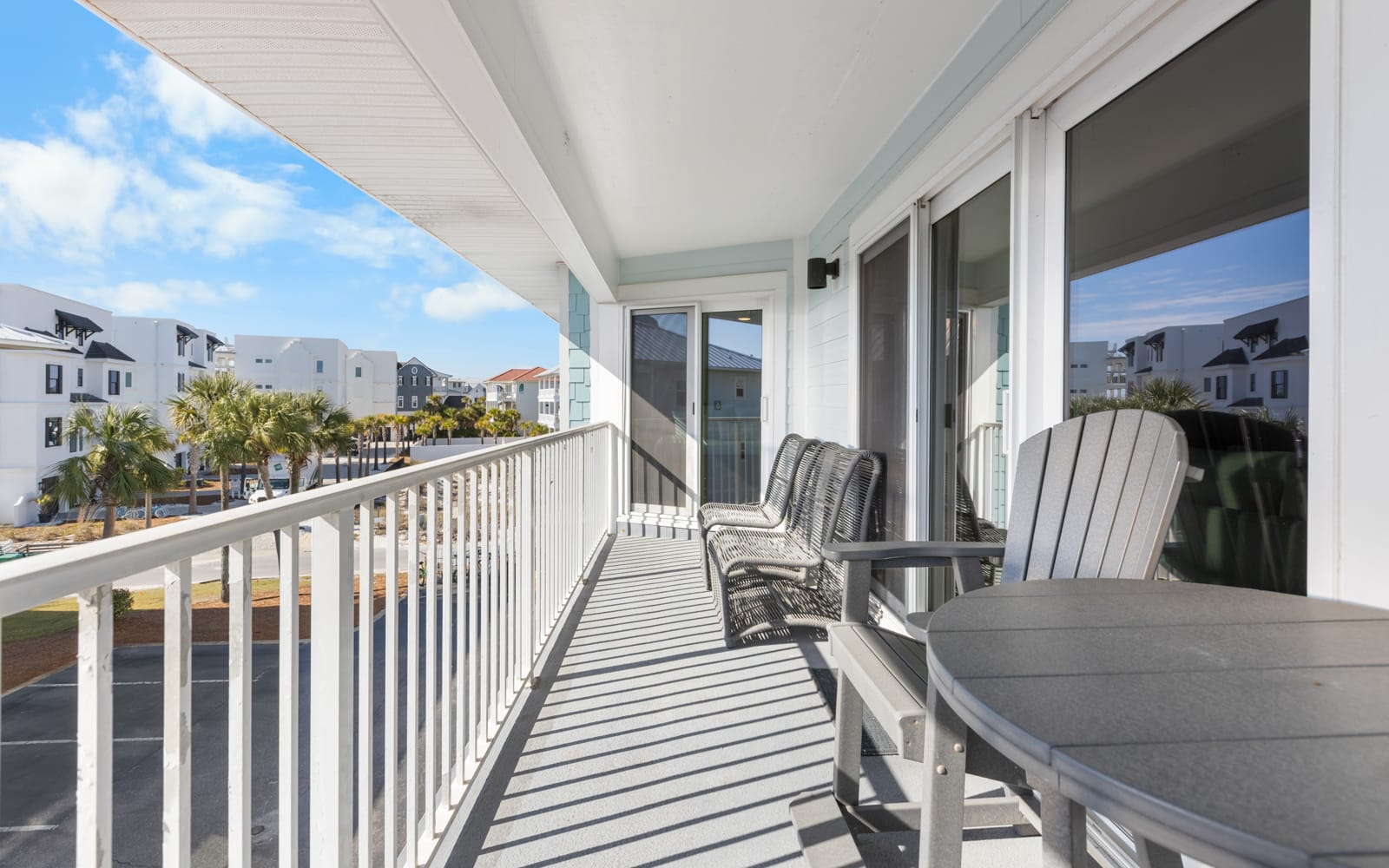 Step onto your private balcony and sink into comfortable outdoor seating while soaking up the coastal views and gentle breeze.