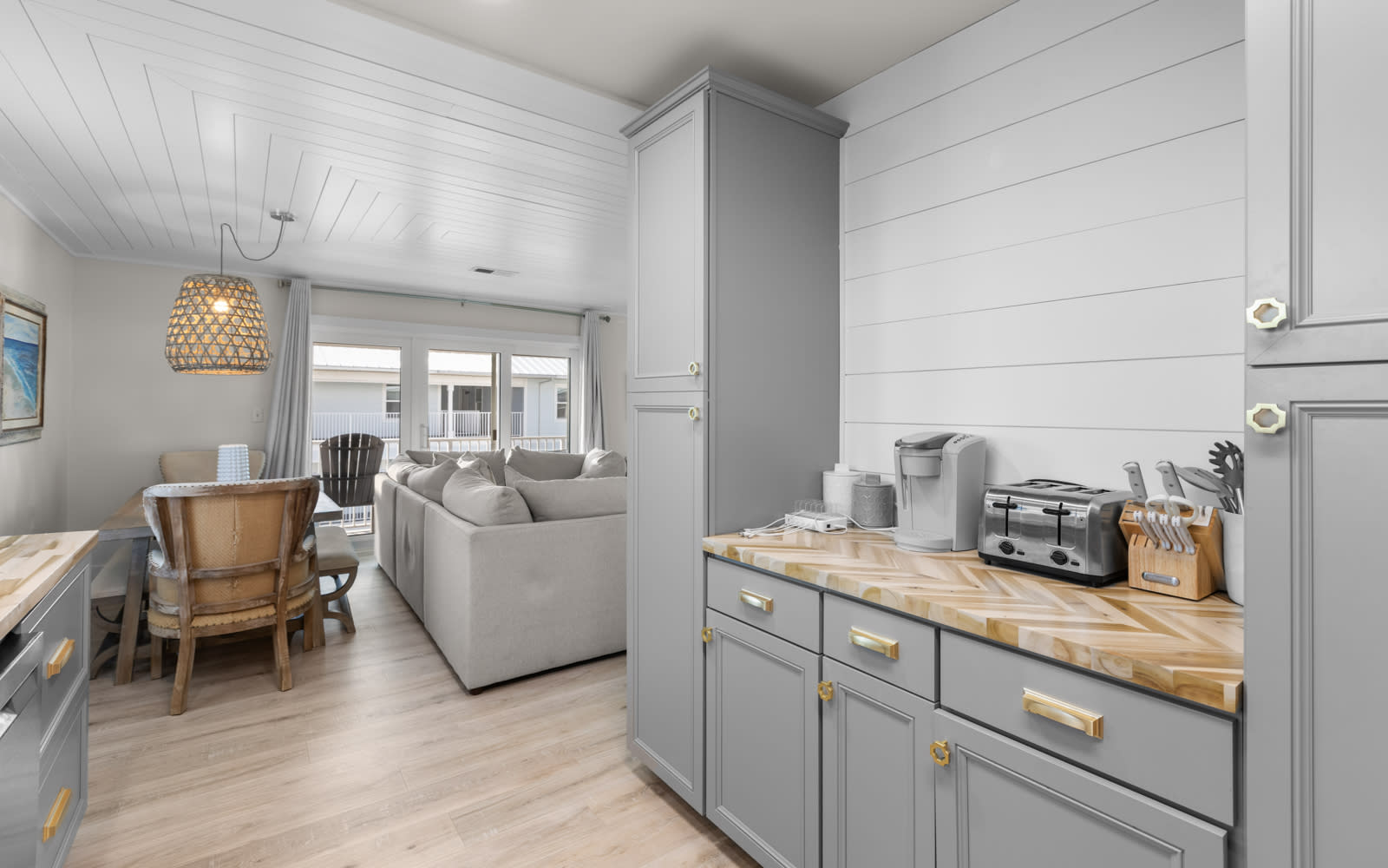 You'll love the seamless flow between your stylish kitchen and cozy living space, perfect for morning coffee or evening conversations.