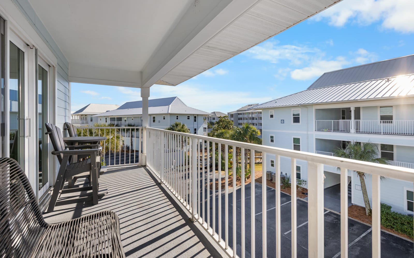 Step onto your private balcony and soak in the coastal charm. Sip morning coffee as gentle breezes carry ocean scents through this peaceful retreat.