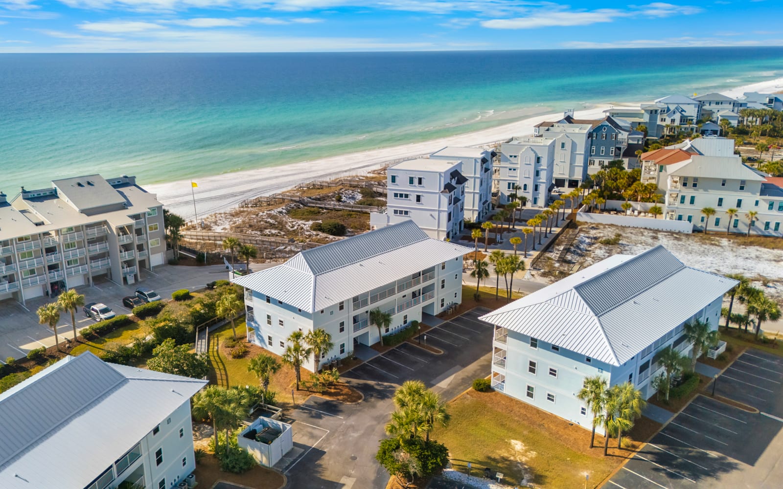 Beachfront property complex offering direct access to pristine white sand beaches and crystal-clear Gulf waters.
