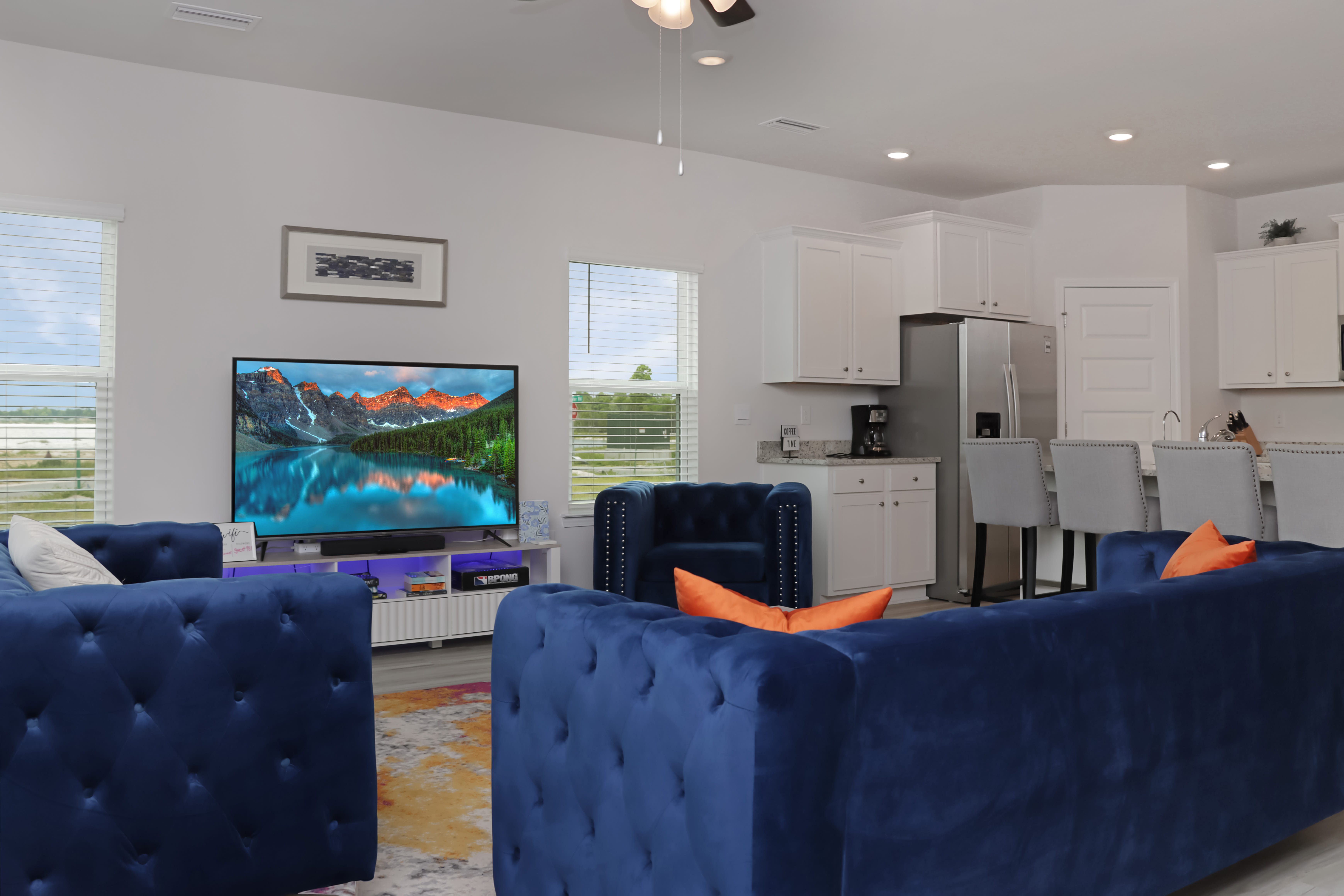 Living Room TV and Kitchen